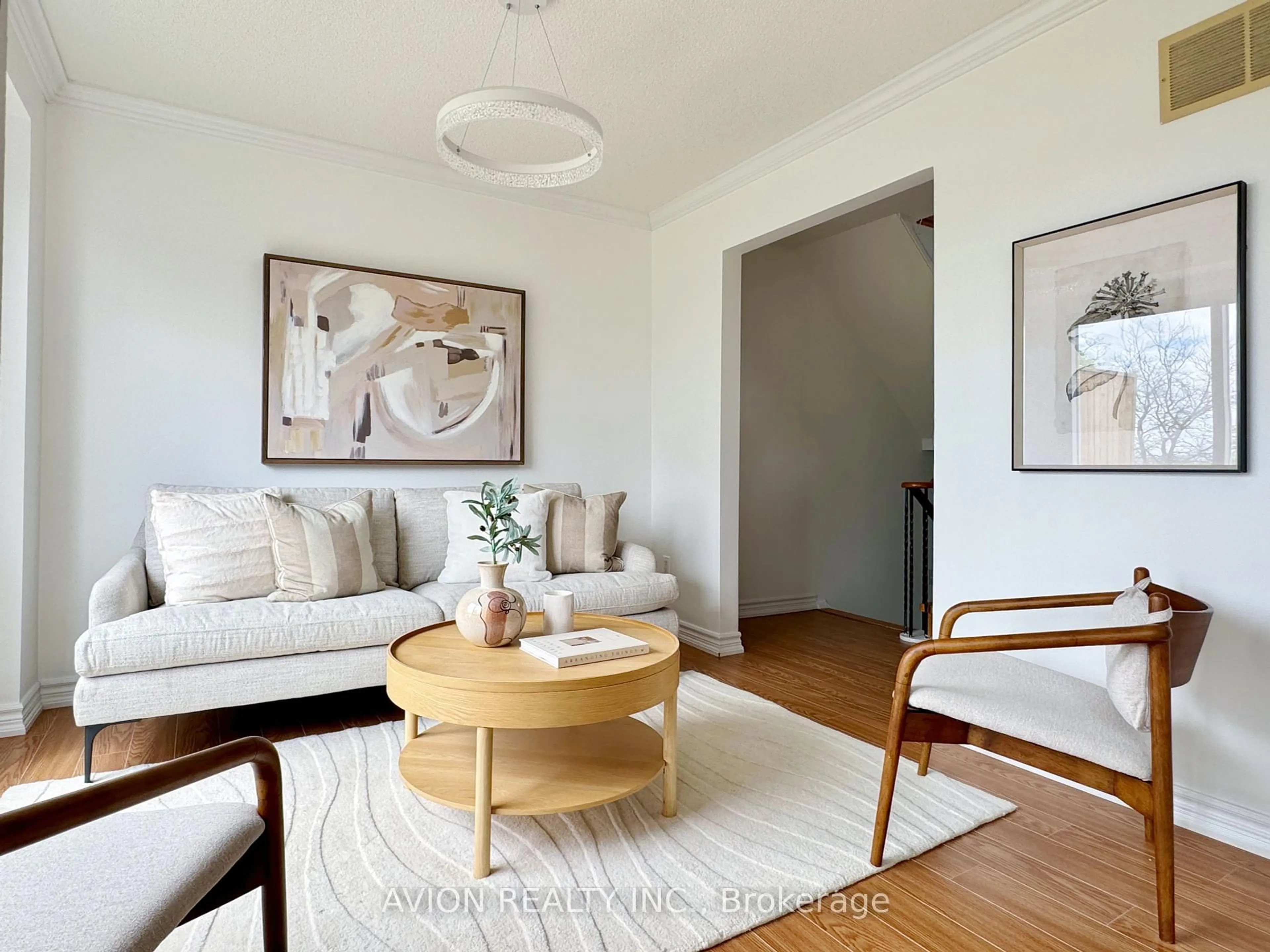 Living room with furniture, wood/laminate floor for 16 Glencoyne Cres, Toronto Ontario M1W 2Z2