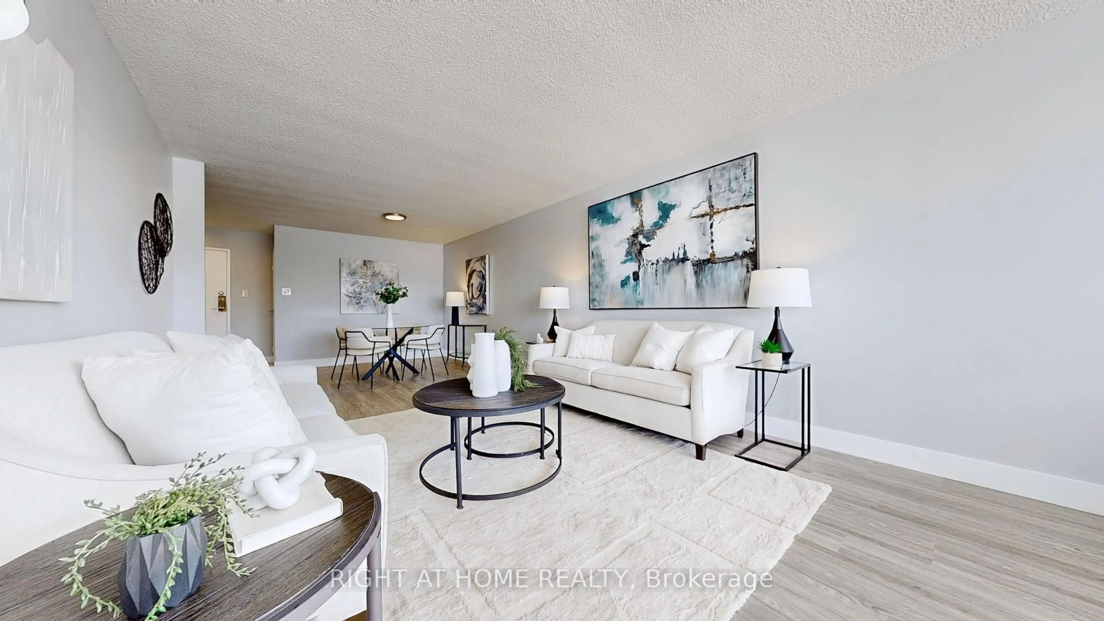 Living room with furniture, unknown for 3151 Bridletowne Circ #702, Toronto Ontario M1W 2T1