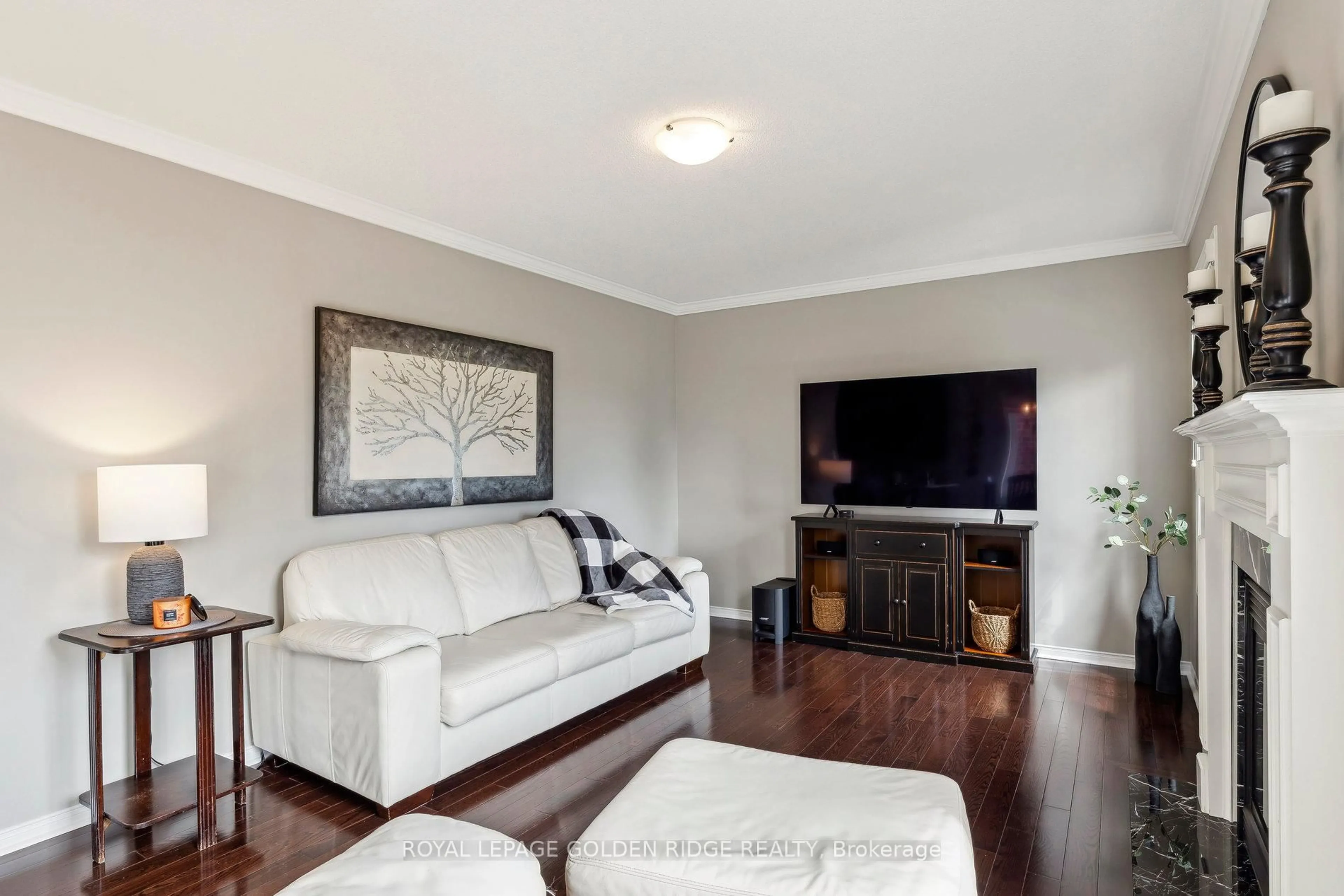 Living room with furniture, wood/laminate floor for 805 Fetchison Dr, Oshawa Ontario L1K 0L5