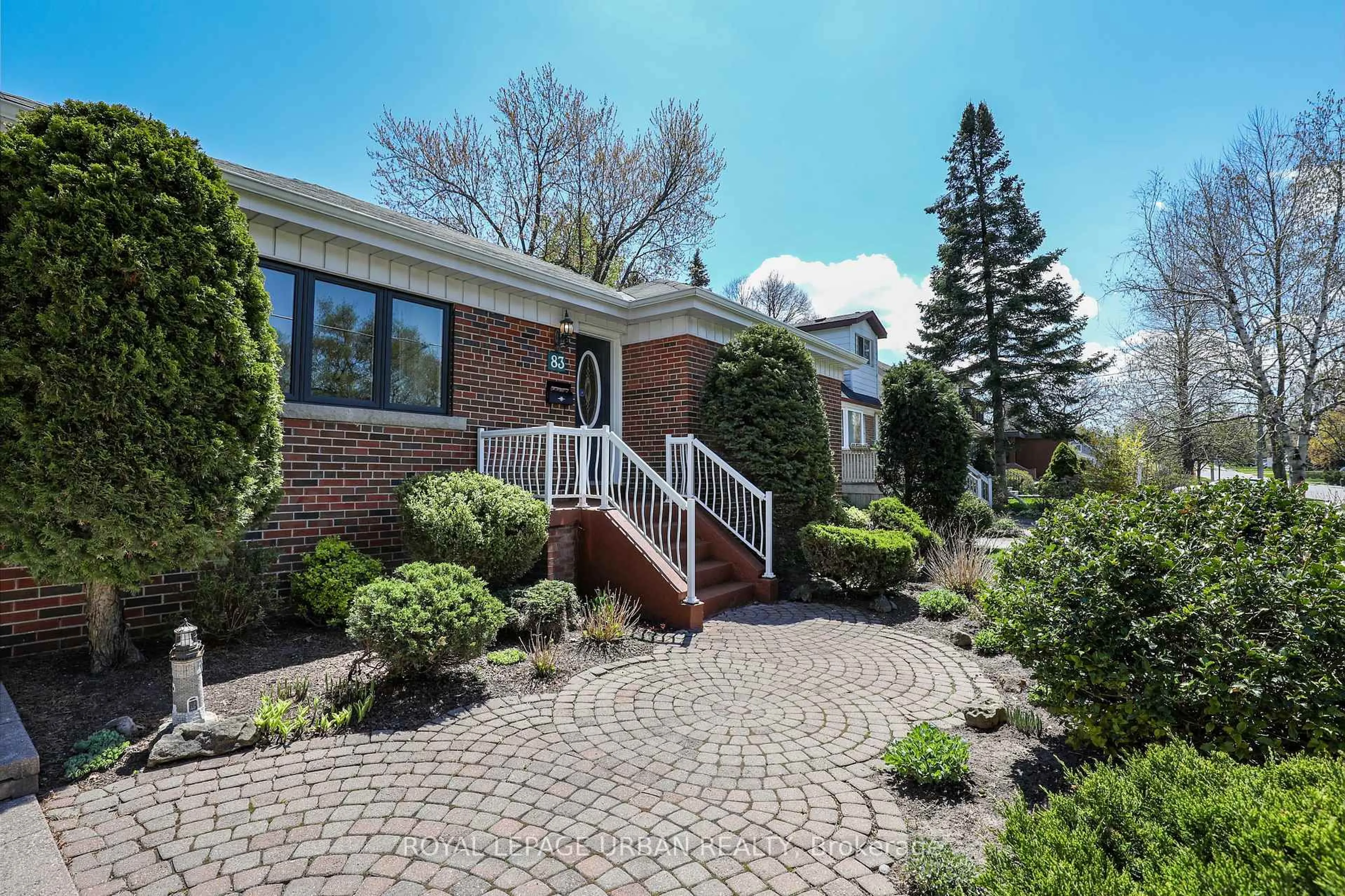 Home with brick exterior material, street for 83 Adanac Dr, Toronto Ontario M1M 2E7