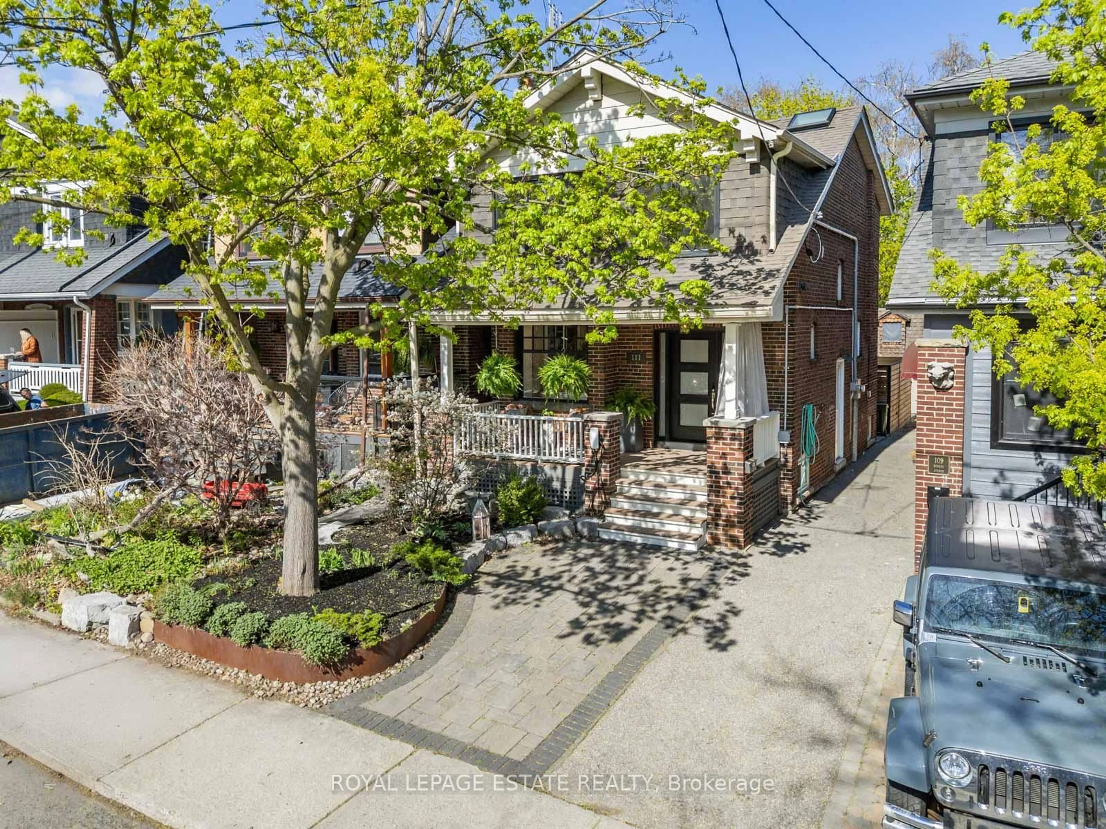 Home with brick exterior material, street for 111 Wineva Ave, Toronto Ontario M4E 2T1