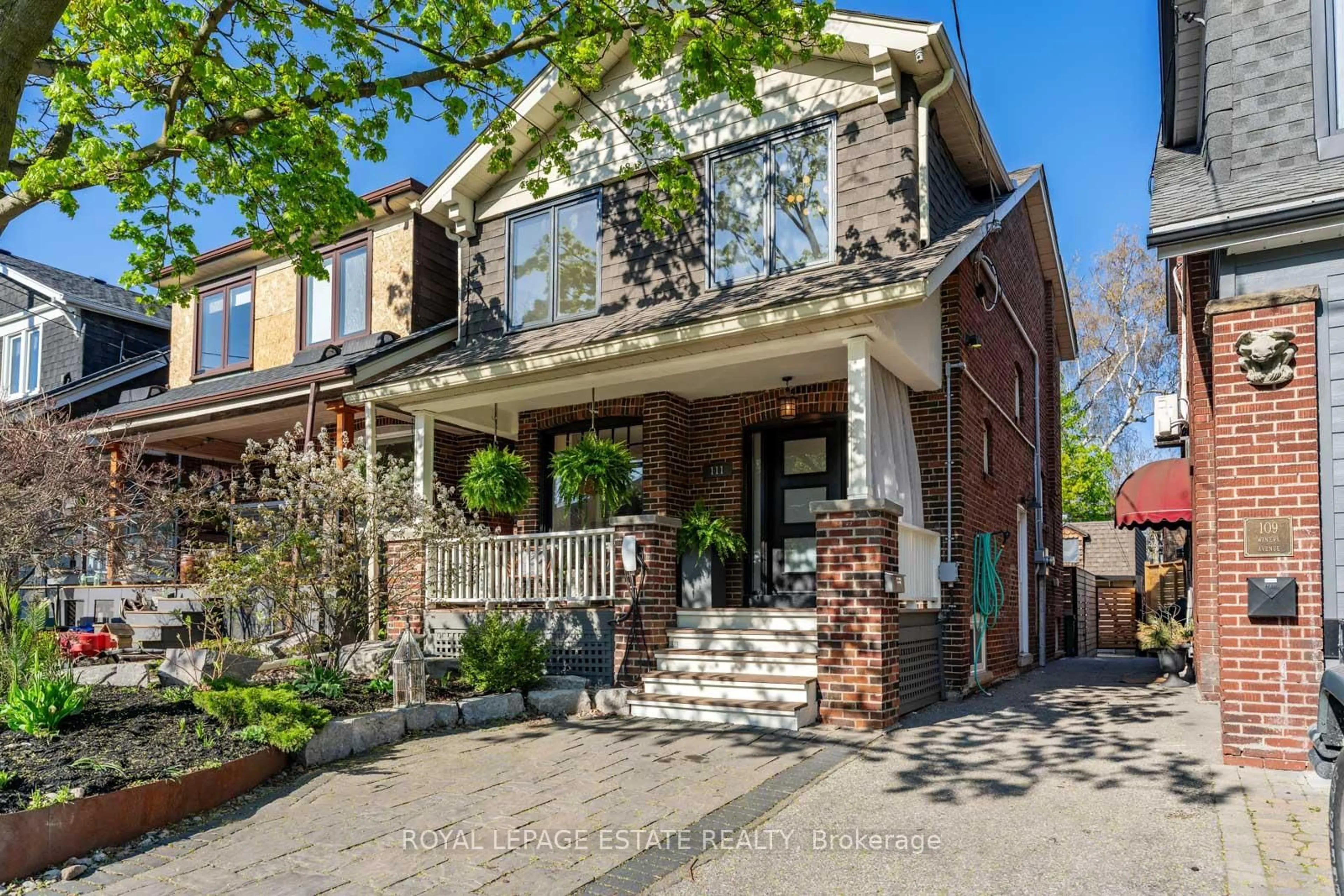 Home with brick exterior material, street for 111 Wineva Ave, Toronto Ontario M4E 2T1