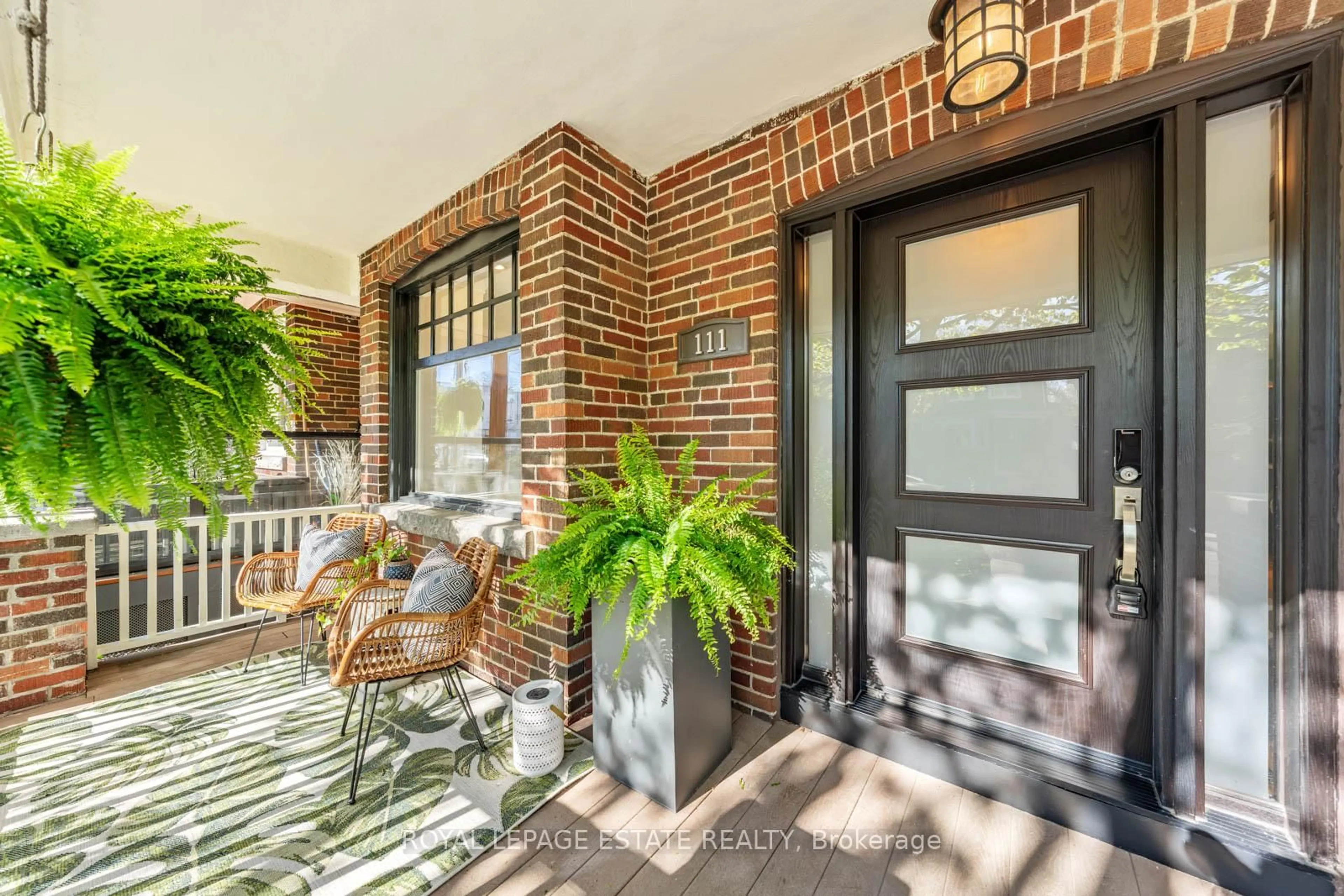 Home with brick exterior material, street for 111 Wineva Ave, Toronto Ontario M4E 2T1