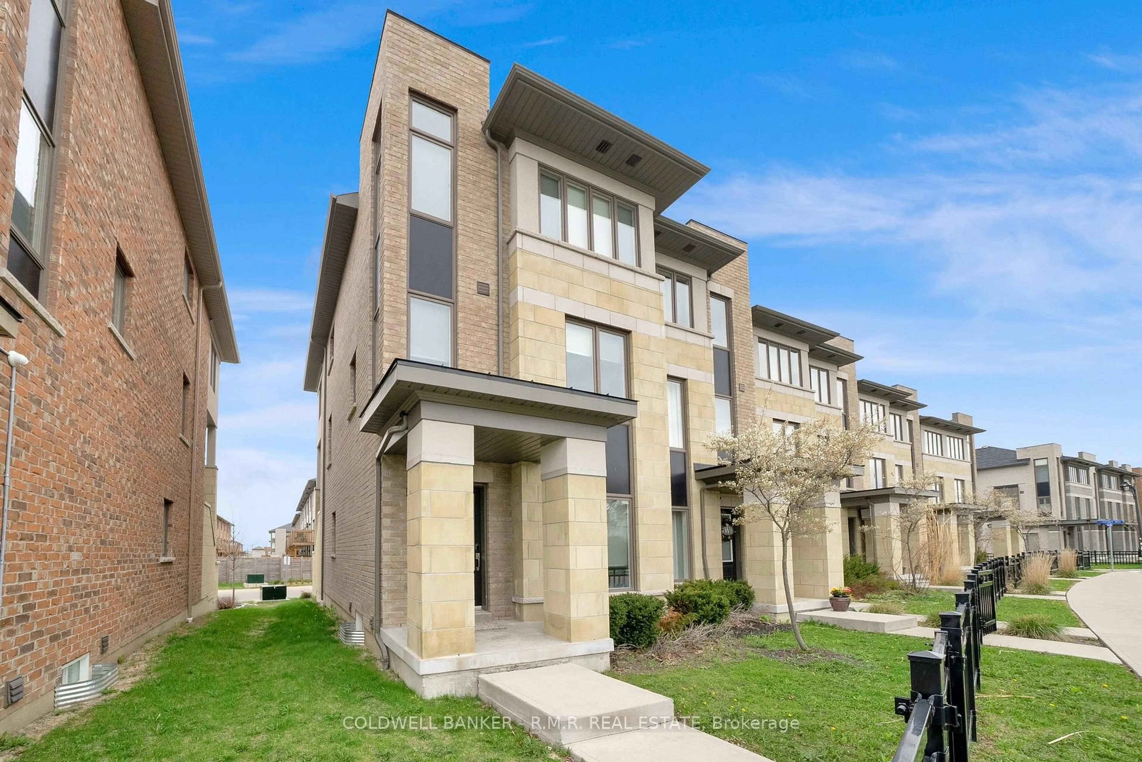 Home with brick exterior material, street for 15 Shawfield Way #83, Whitby Ontario L1R 0N8