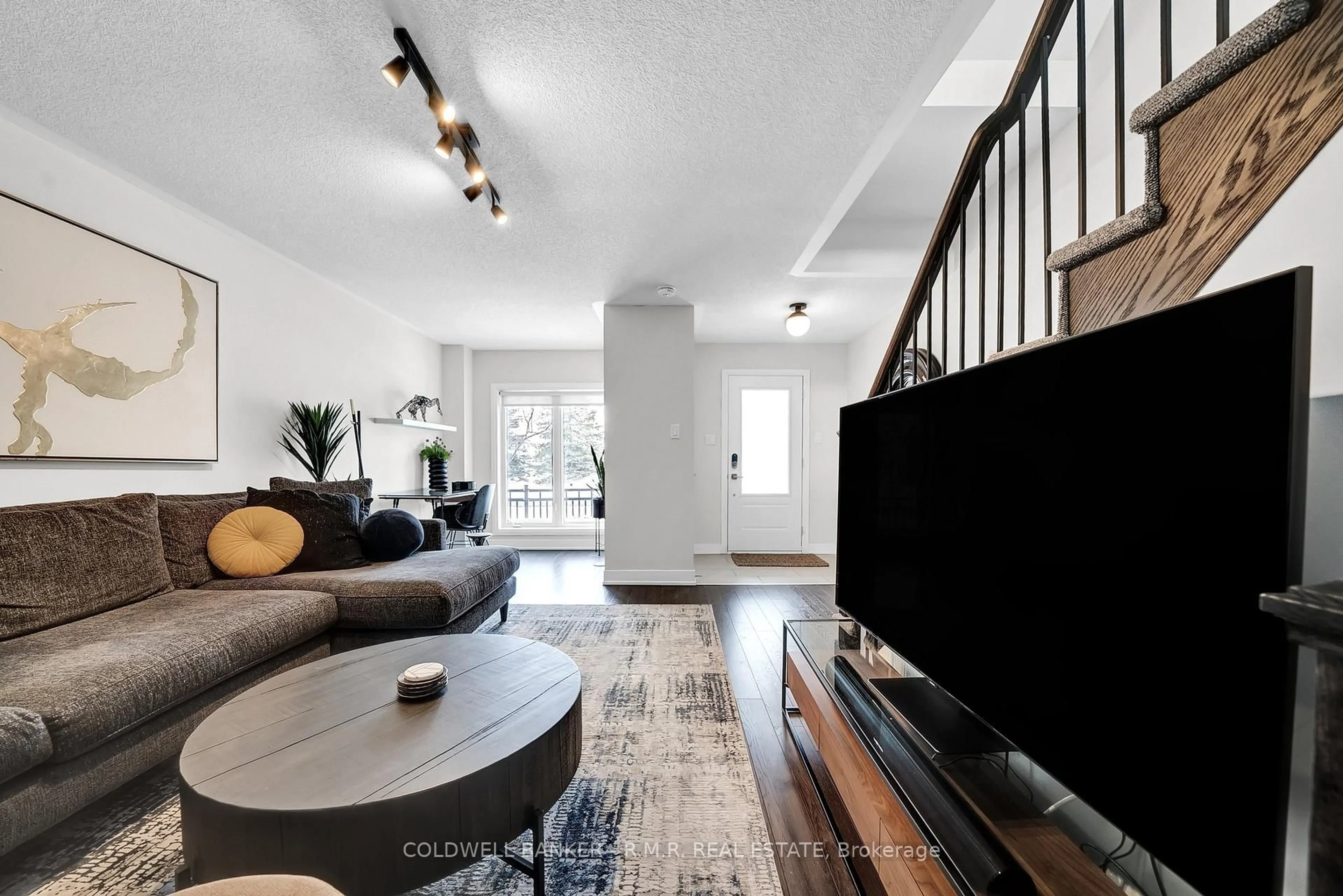 Living room with furniture, unknown for 15 Shawfield Way #83, Whitby Ontario L1R 0N8