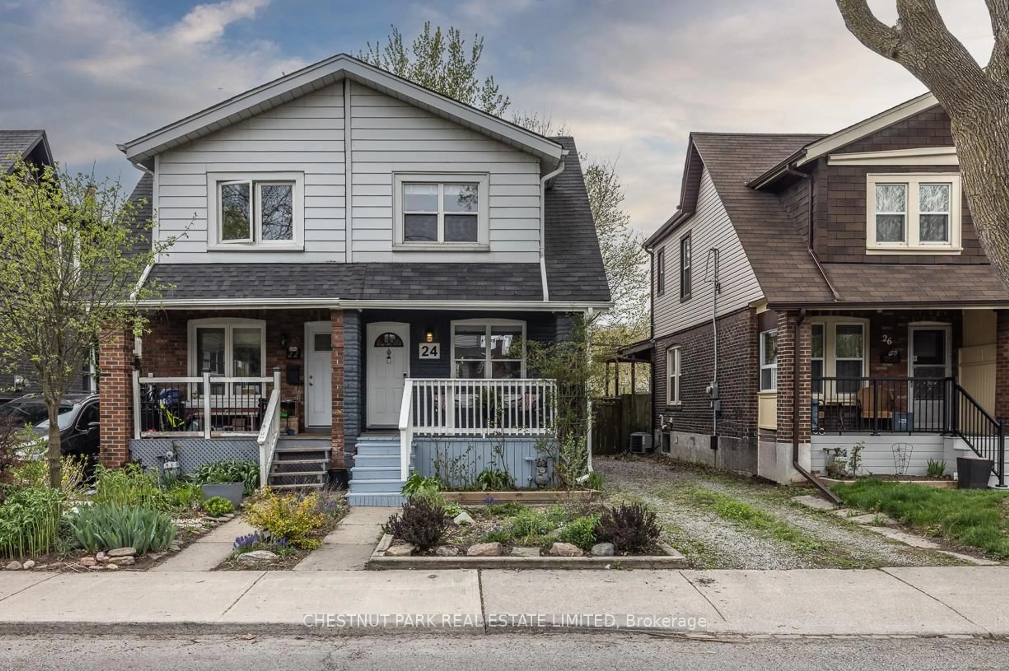Home with brick exterior material, street for 24 Hiltz Ave, Toronto Ontario M4L 2N5