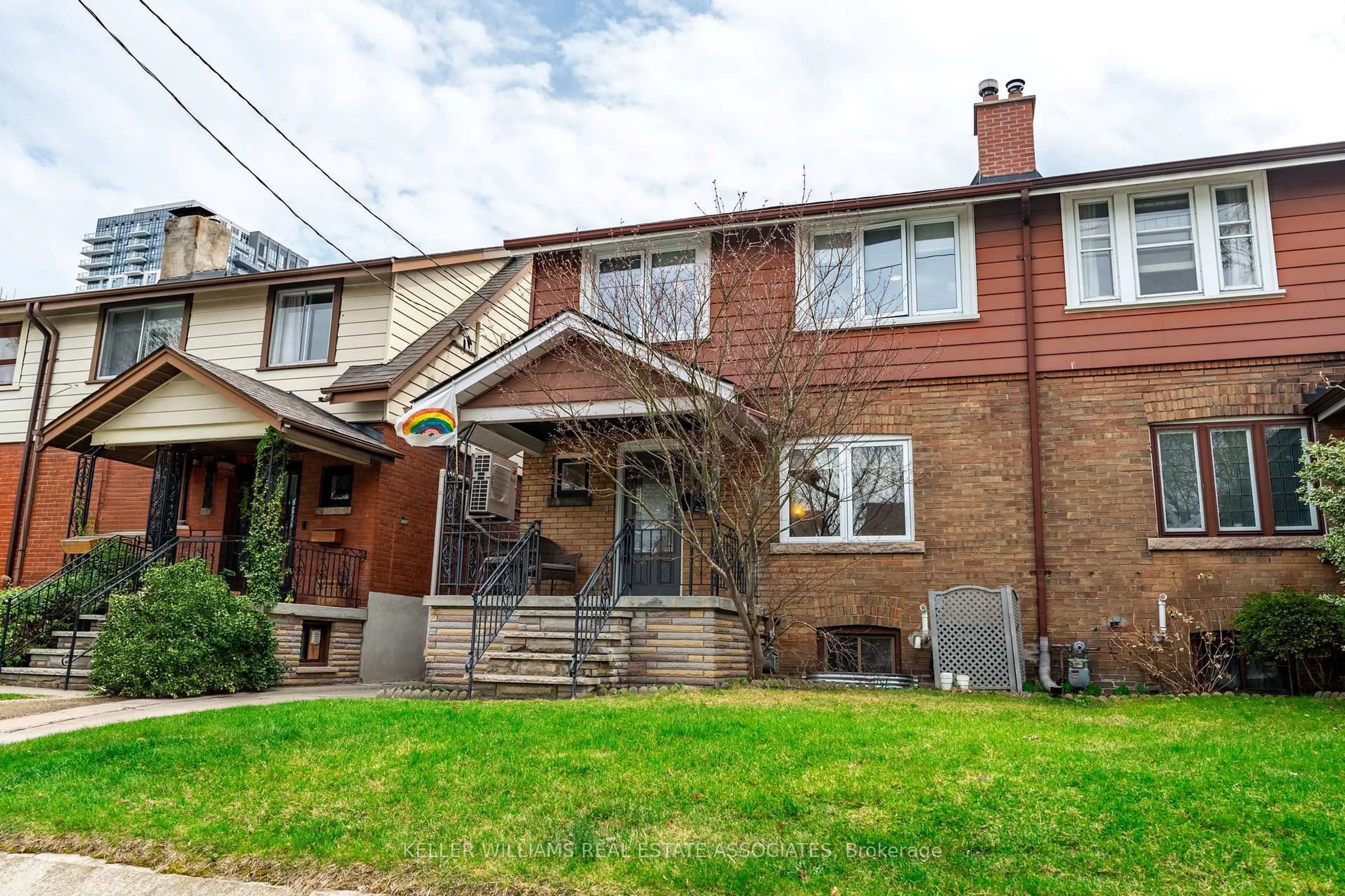 Home with brick exterior material, street for 77 Harris Ave, Toronto Ontario M4C 1P5