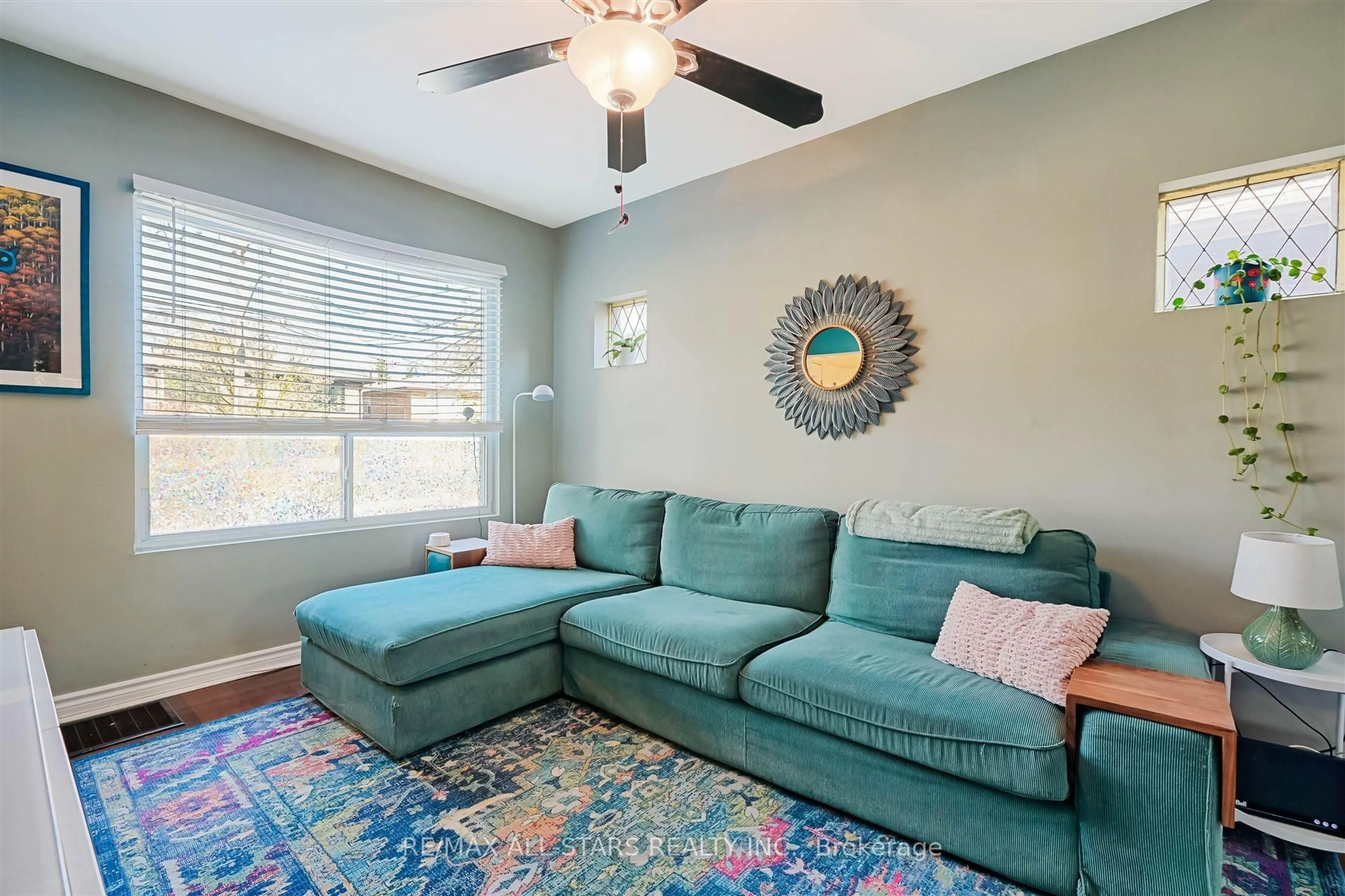 Living room with furniture, carpet floor for 98 Victoria Park Ave, Toronto Ontario M4E 3R9