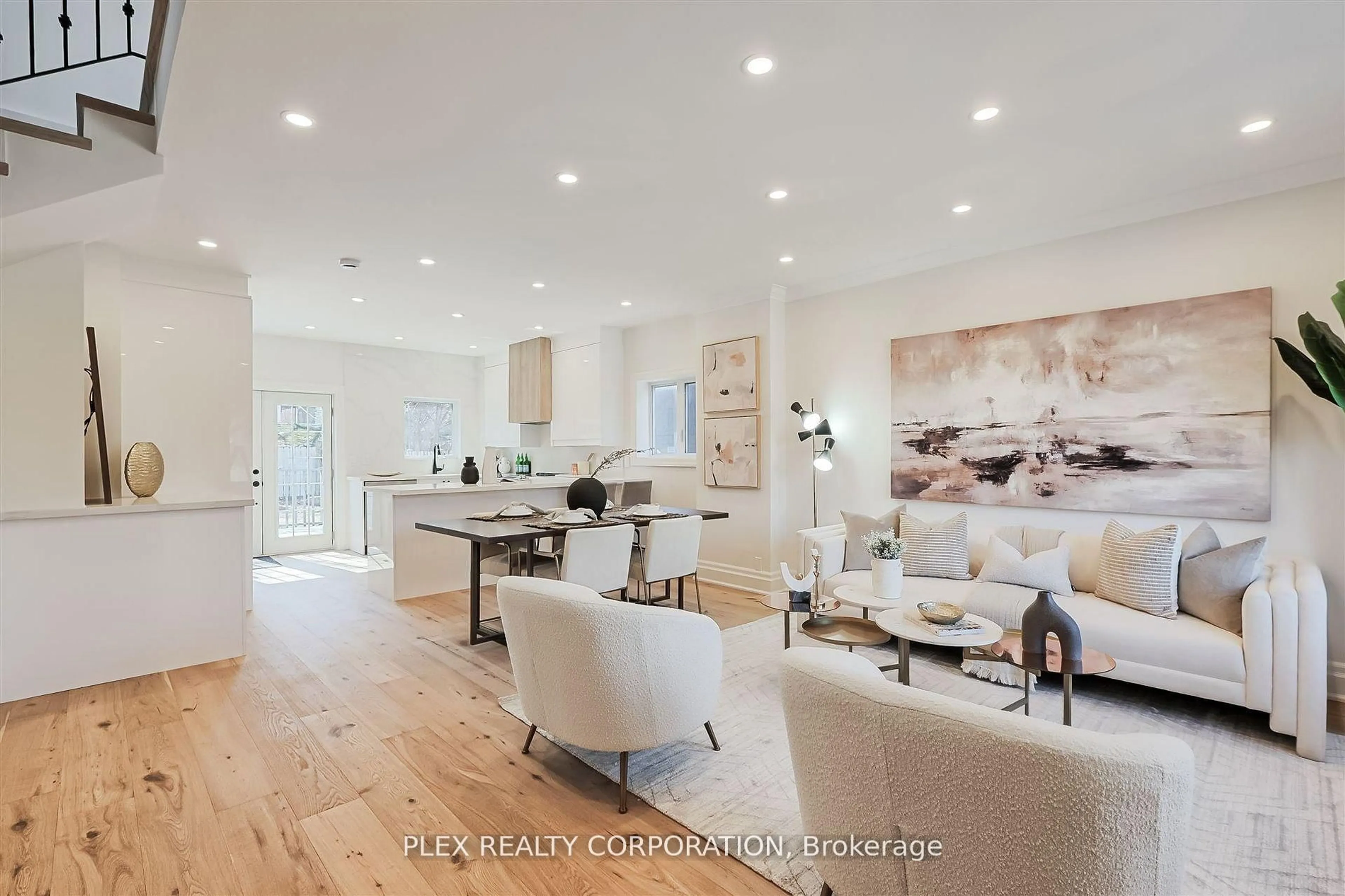 Open concept kitchen, wood/laminate floor for 121 Virginia Ave, Toronto Ontario M4C 2T1