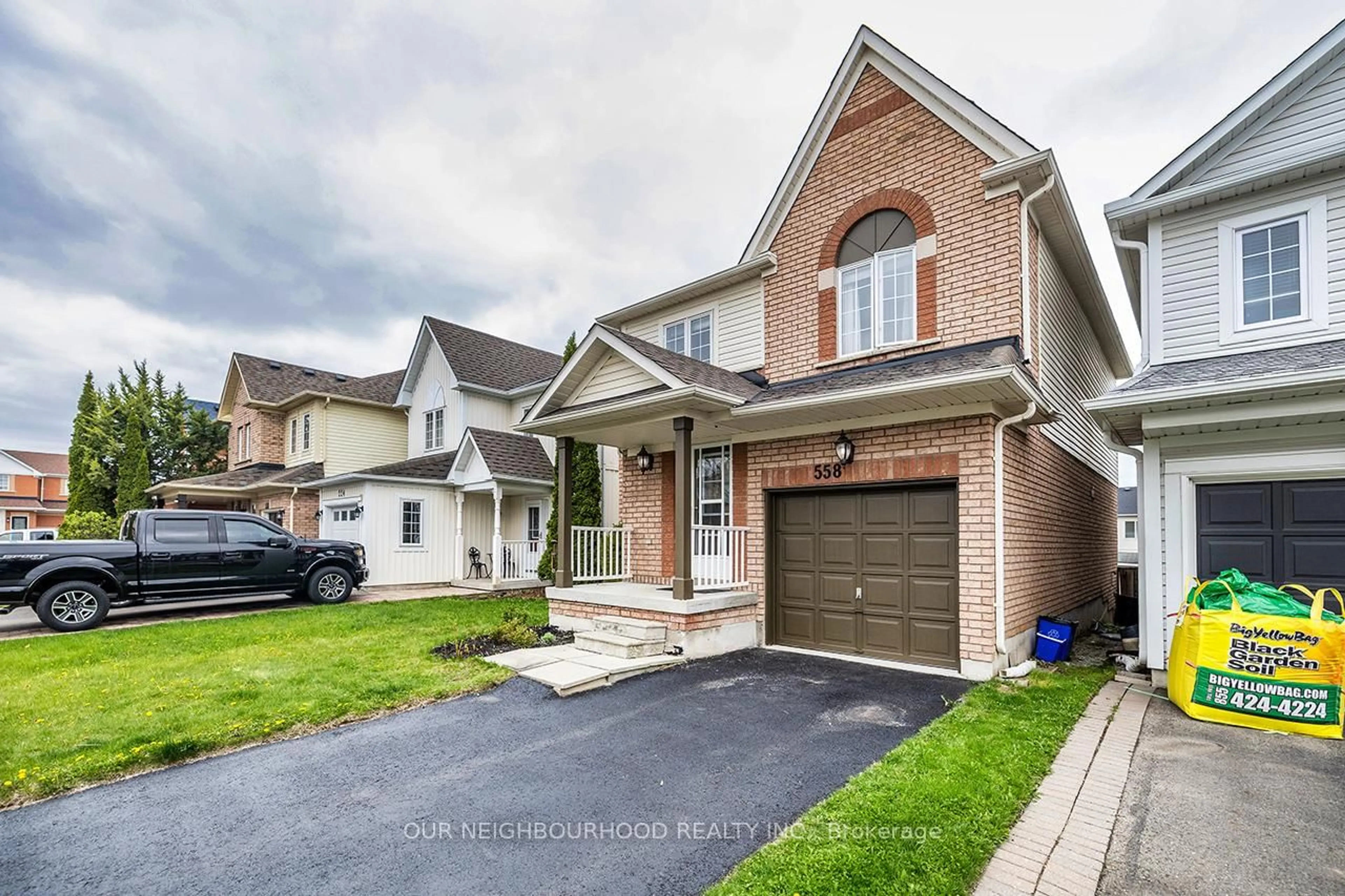 Home with brick exterior material, street for 558 Brasswinds Tr, Oshawa Ontario L1K 2Y9