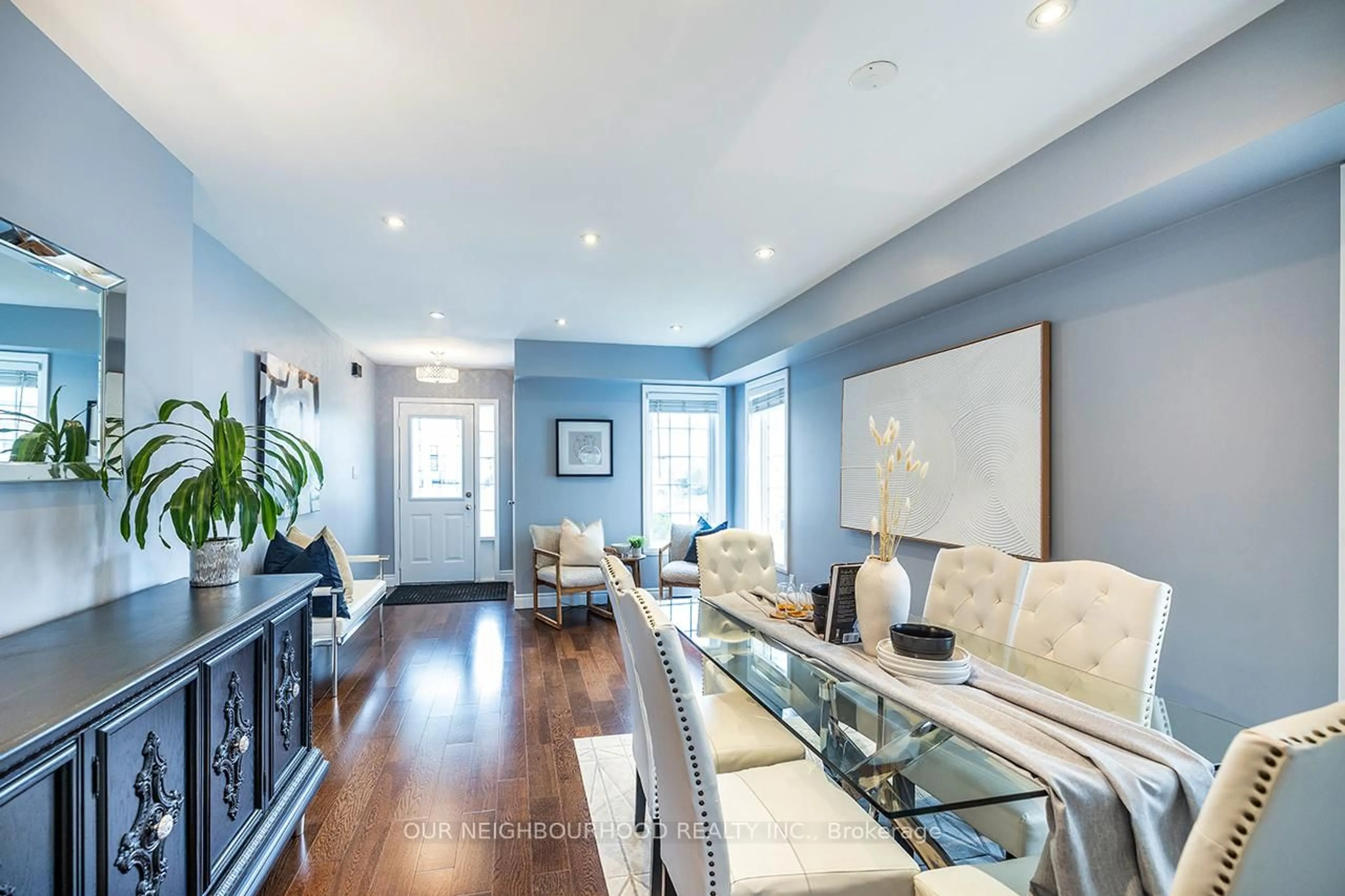 Living room with furniture, wood/laminate floor for 558 Brasswinds Tr, Oshawa Ontario L1K 2Y9