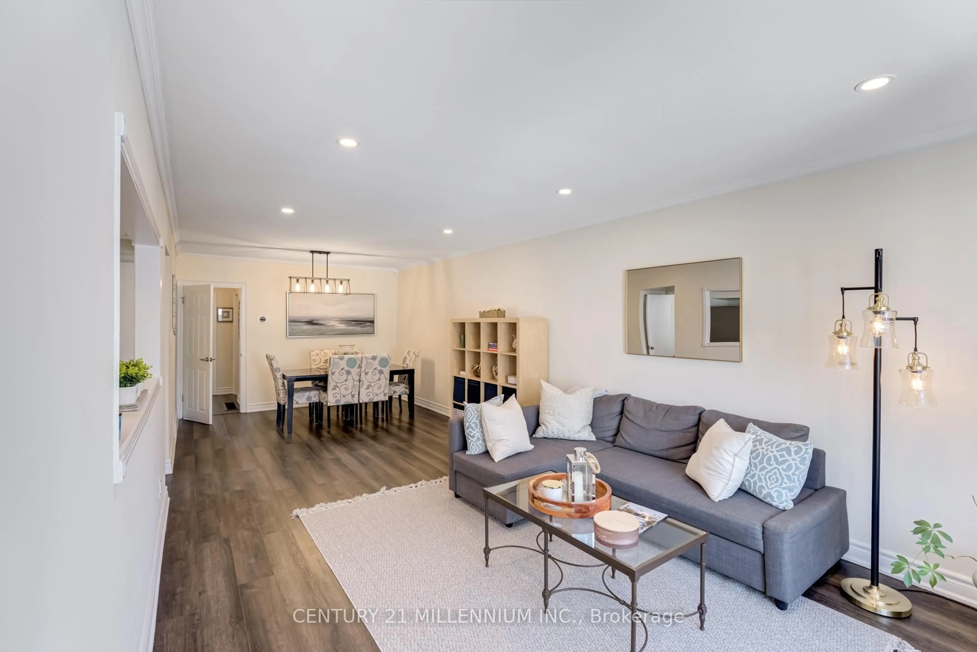 Living room with furniture, wood/laminate floor for 61 Newlands Ave, Toronto Ontario M1L 1S1
