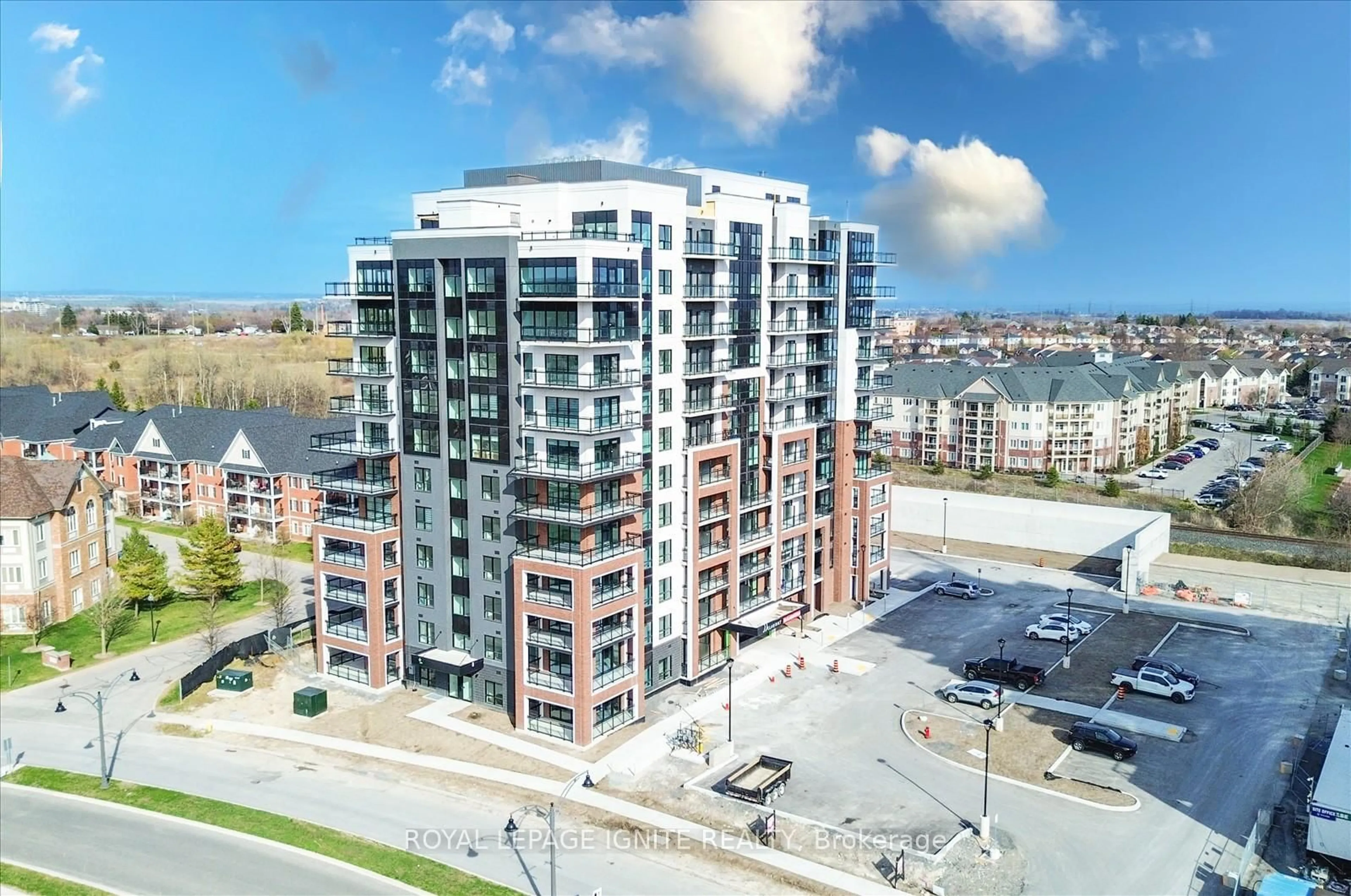 A pic from outside/outdoor area/front of a property/back of a property/a pic from drone, building for 55 Clarington Blvd #410, Clarington Ontario L1C 7J4