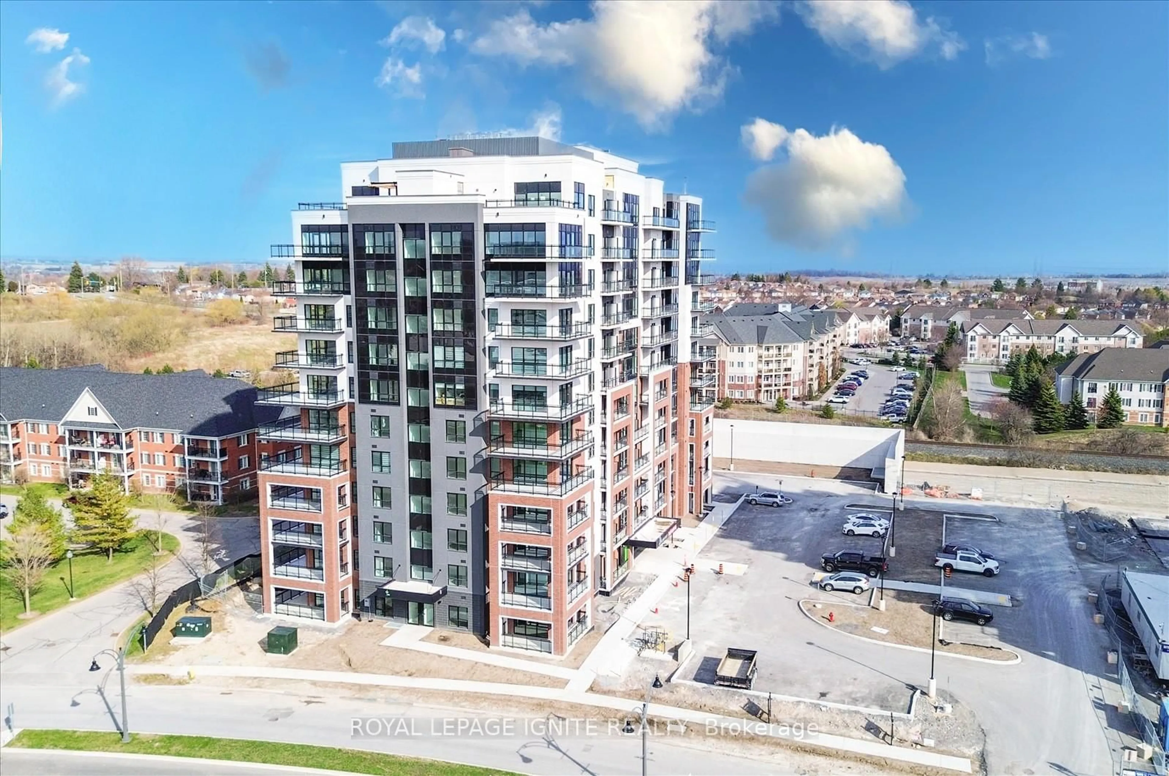A pic from outside/outdoor area/front of a property/back of a property/a pic from drone, unknown for 55 Clarington Blvd #410, Clarington Ontario L1C 7J4