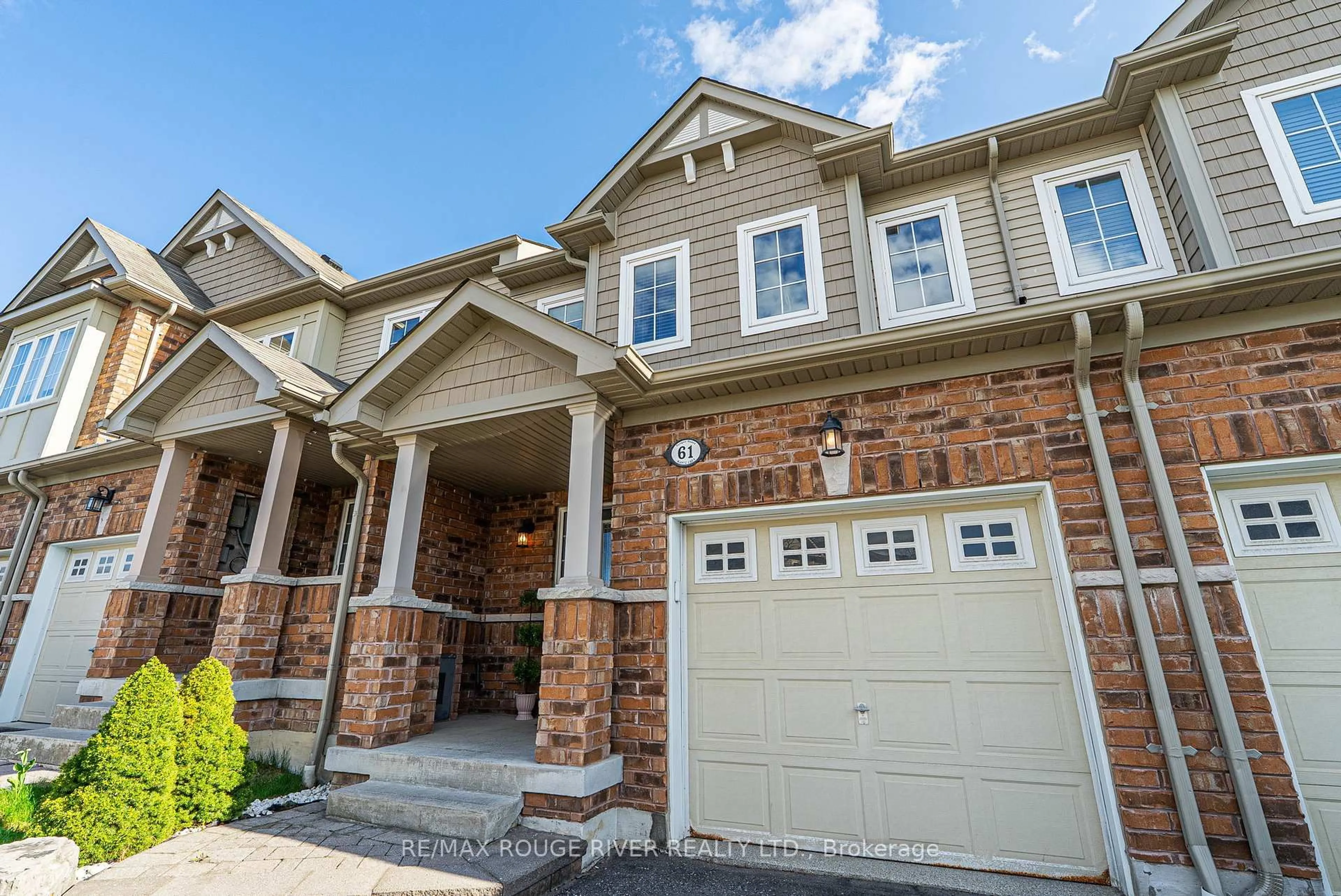 Home with brick exterior material, street for 61 Mantz Cres, Whitby Ontario L1R 0L2