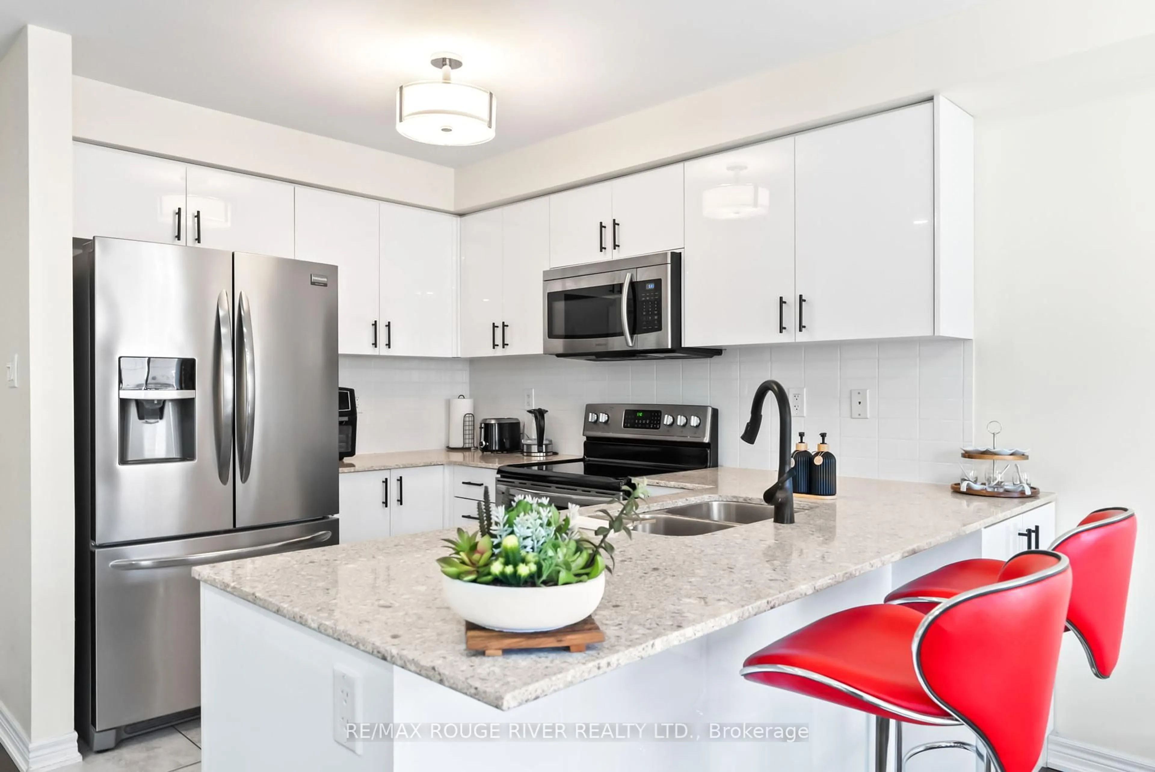 Open concept kitchen, ceramic/tile floor for 61 Mantz Cres, Whitby Ontario L1R 0L2