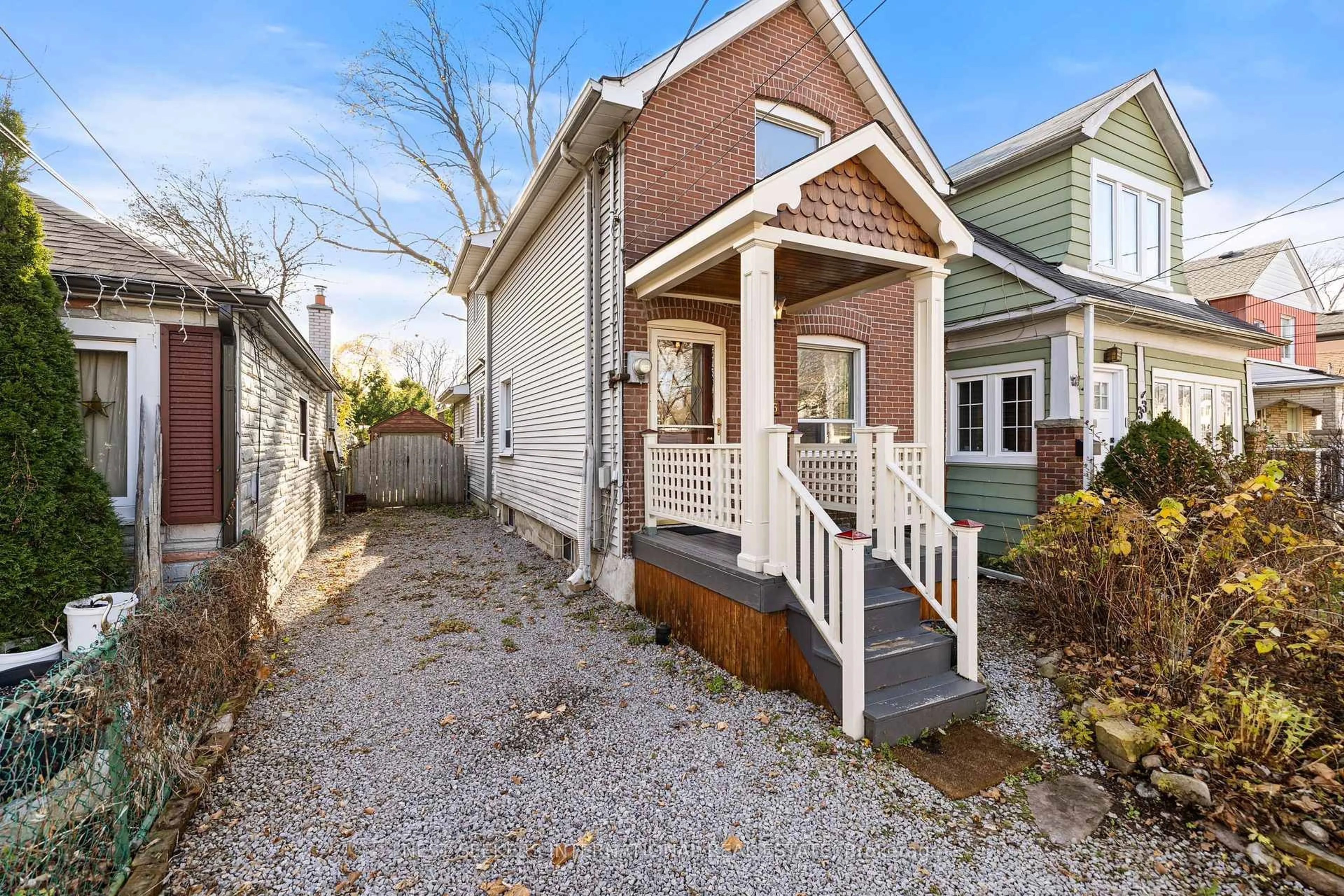 Home with brick exterior material, street for 35 Cambrai Ave, Toronto Ontario M4C 2P7