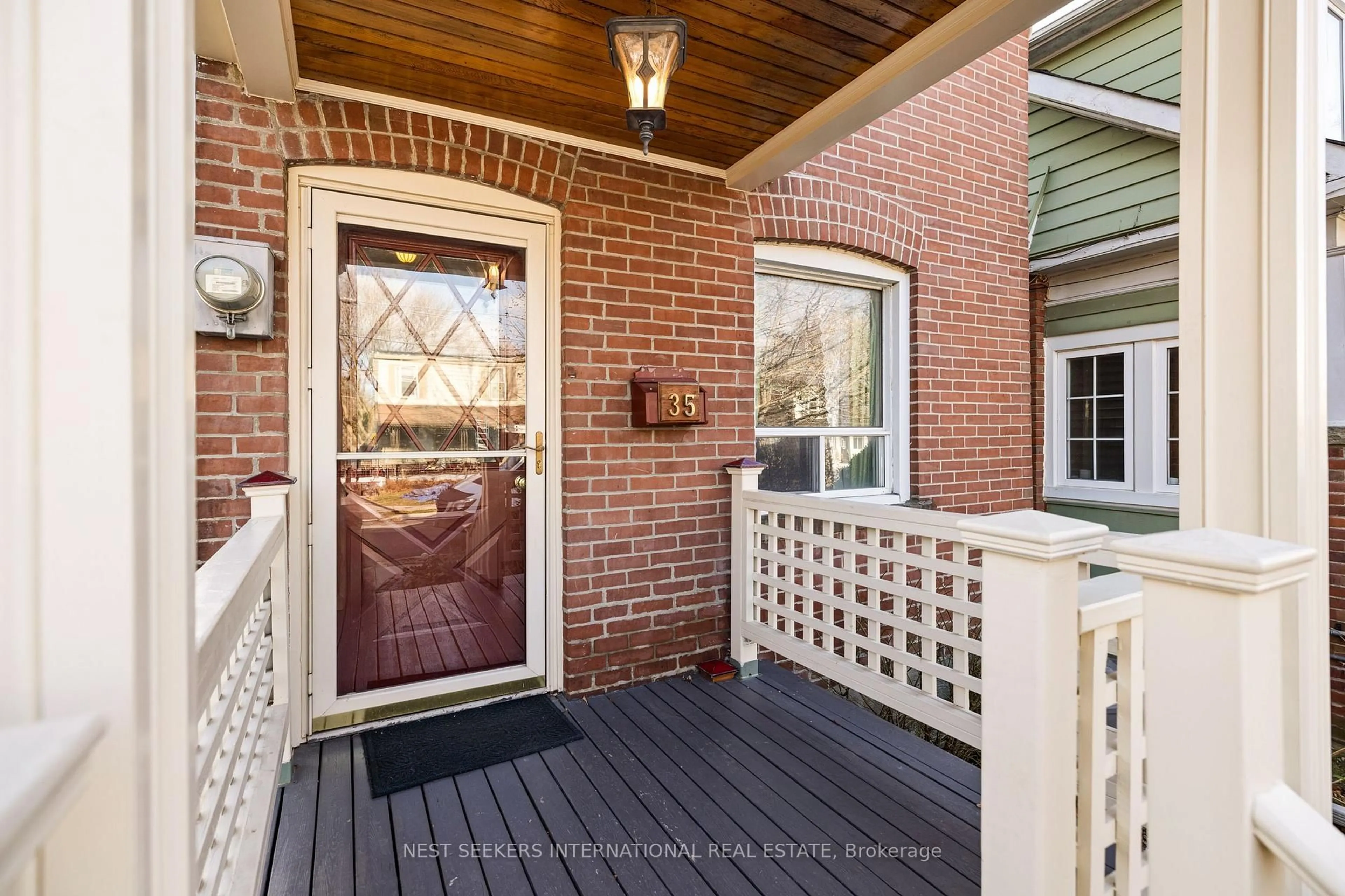 Home with brick exterior material, street for 35 Cambrai Ave, Toronto Ontario M4C 2P7