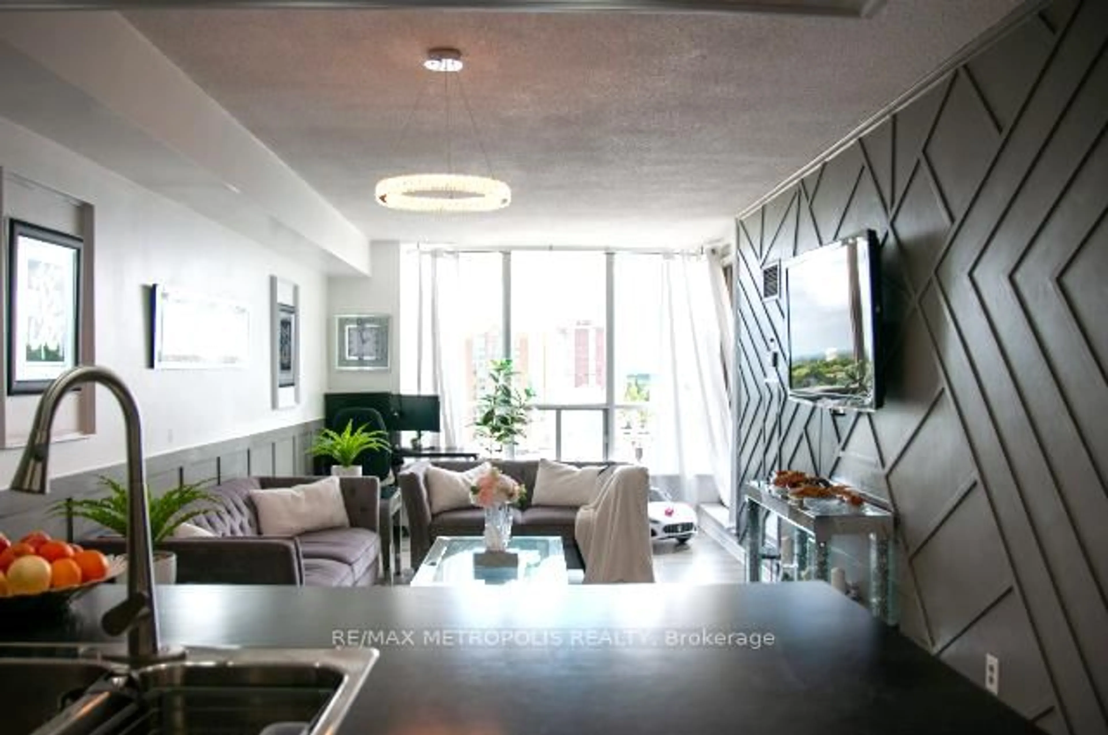 Living room with furniture, unknown for 410 Mclevin Ave #1011, Toronto Ontario M1B 5J5