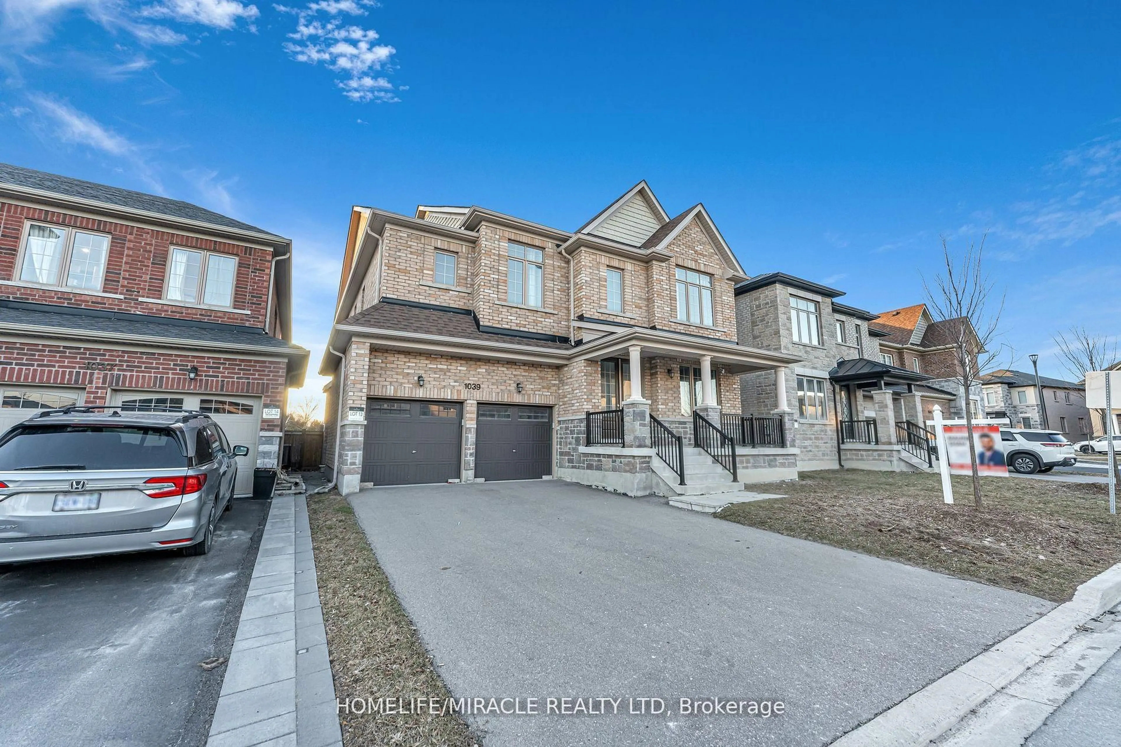 Home with brick exterior material, street for 1039 Kingpeak Cres, Pickering Ontario L1X 0H3
