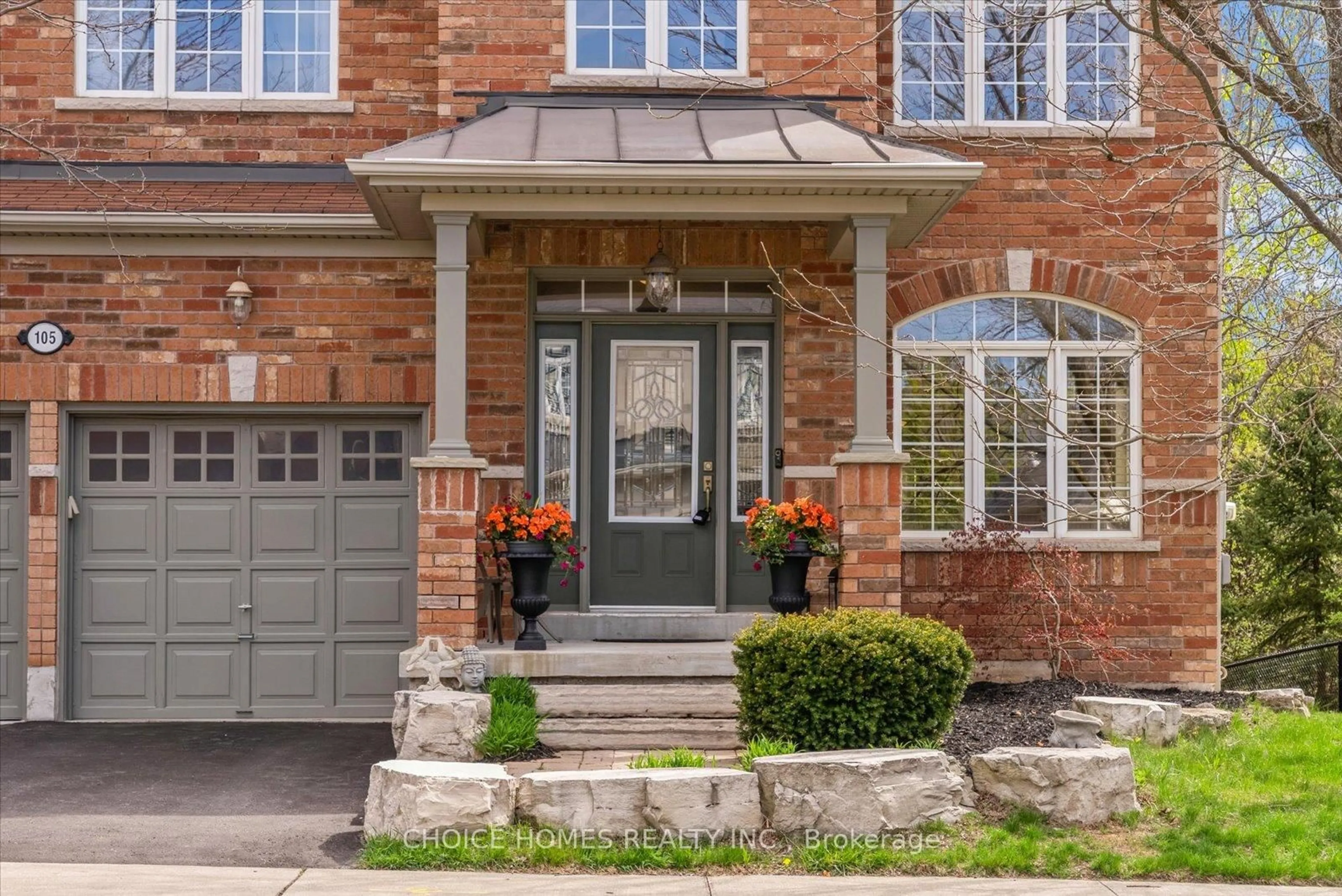 Home with brick exterior material, street for 105 Rivers Edge Pl, Whitby Ontario L1R 0G5