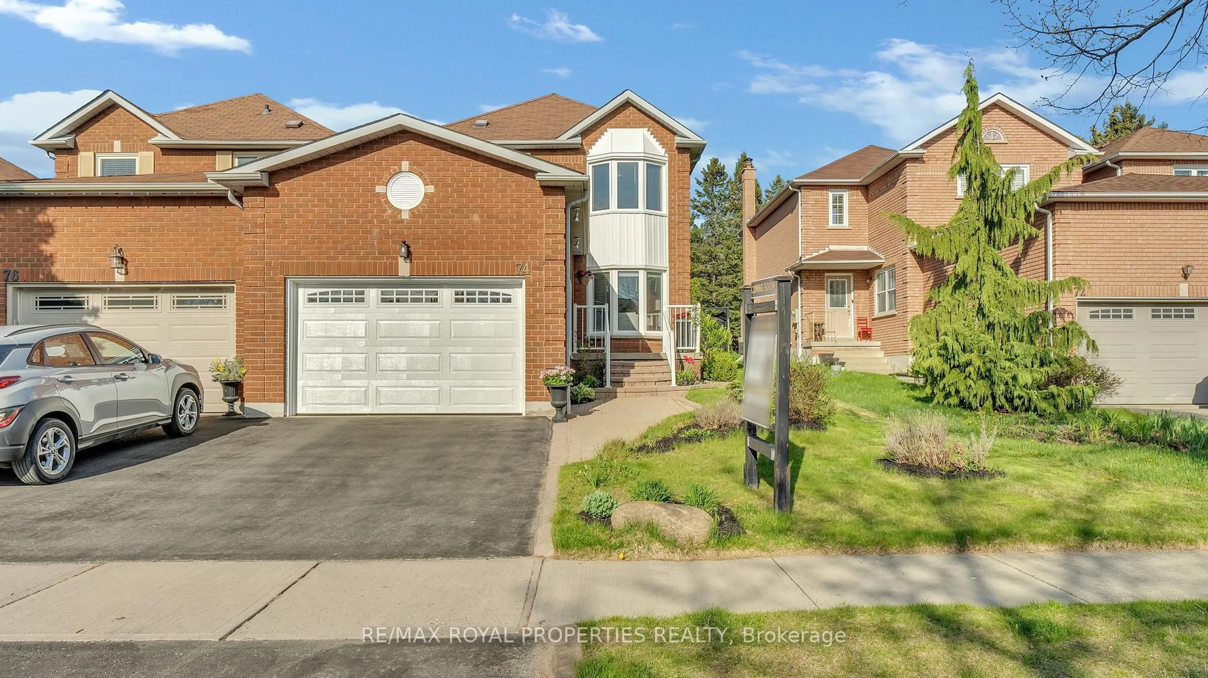 Home with brick exterior material, street for 74 Erickson Dr, Whitby Ontario L1N 8Z2