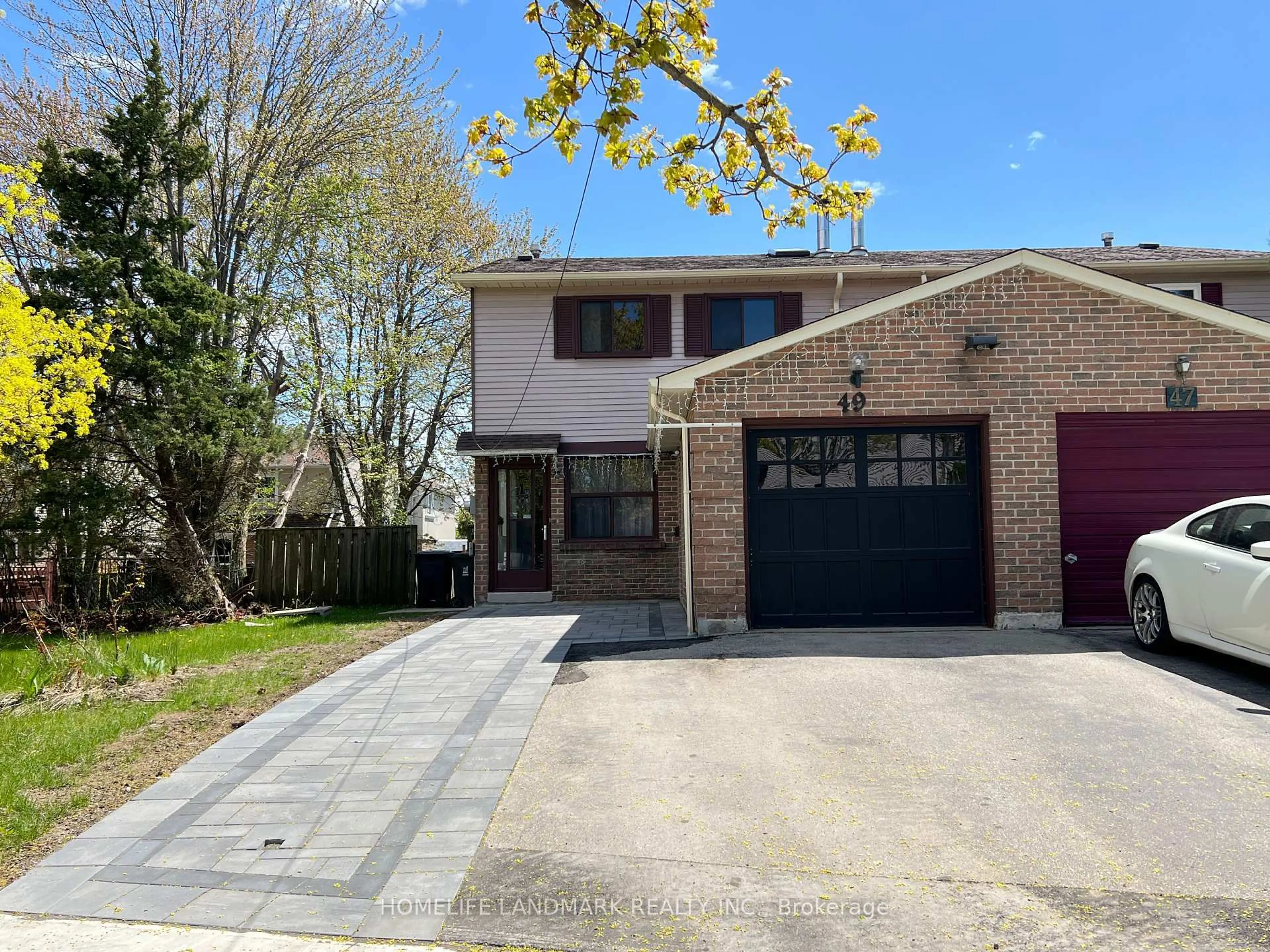 Home with brick exterior material, street for 49 Grenbeck Dr, Toronto Ontario M1V 2H5