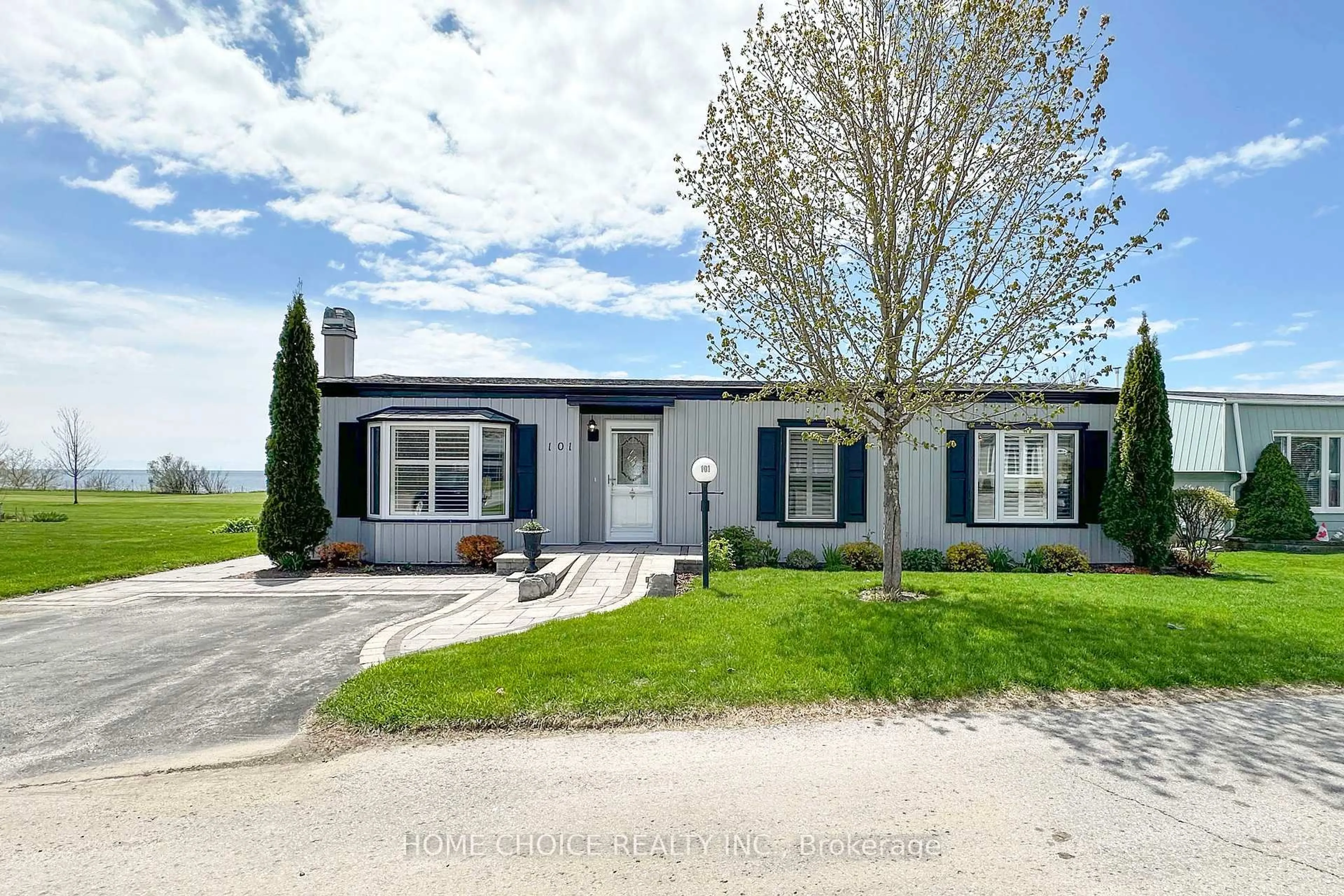 Home with vinyl exterior material, street for 101 The Cove Rd, Clarington Ontario L1B 1B2