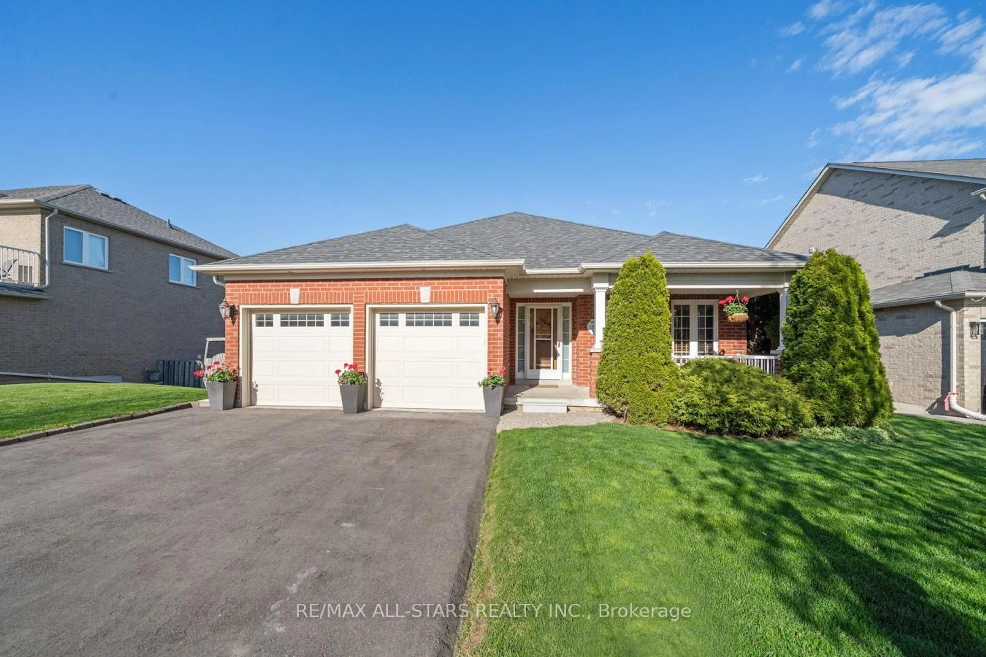 Home with brick exterior material, street for 128 Earl Cuddie Blvd, Scugog Ontario L9L 1E8