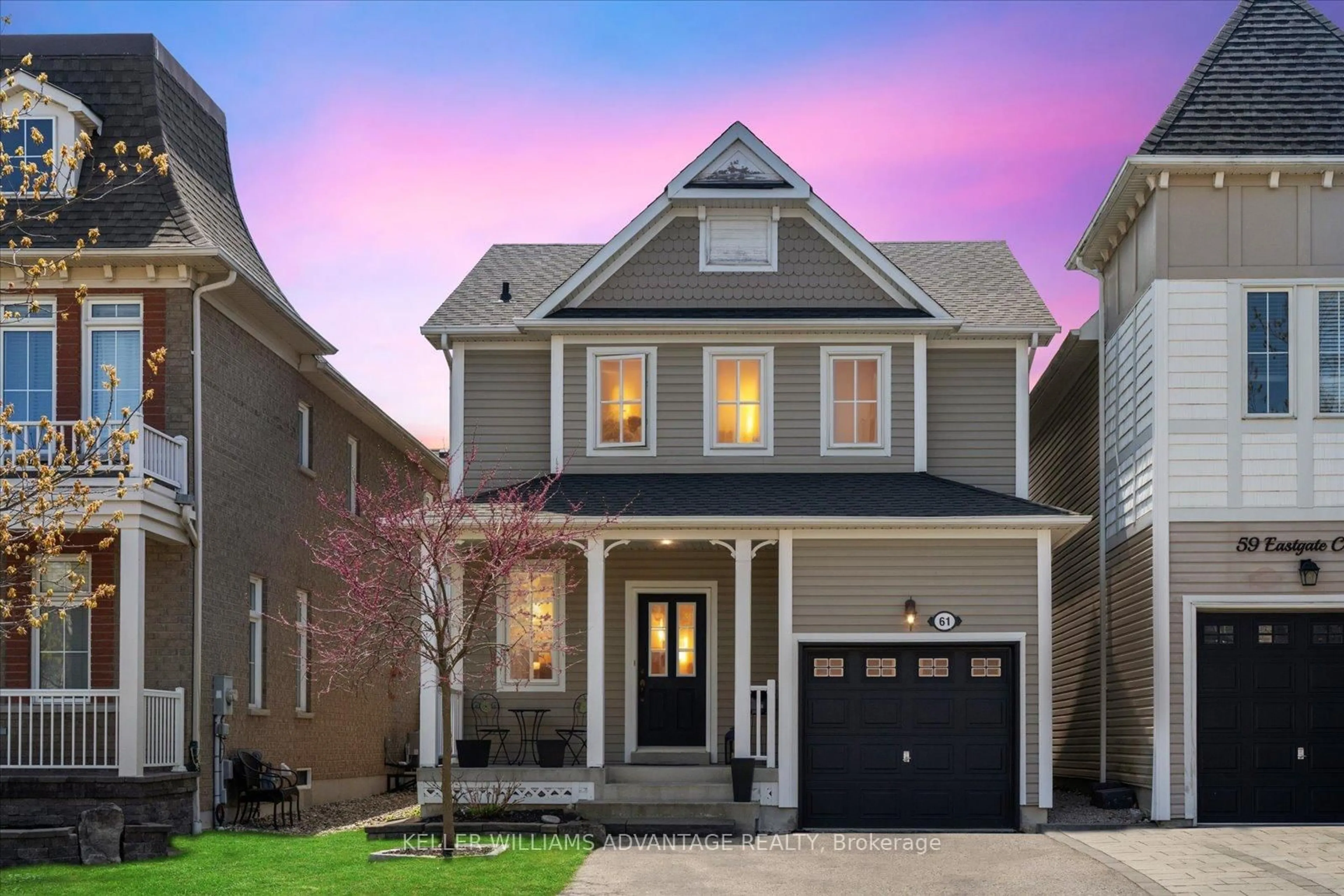 Home with vinyl exterior material, street for 61 Eastgate Circ, Whitby Ontario L1M 2N4