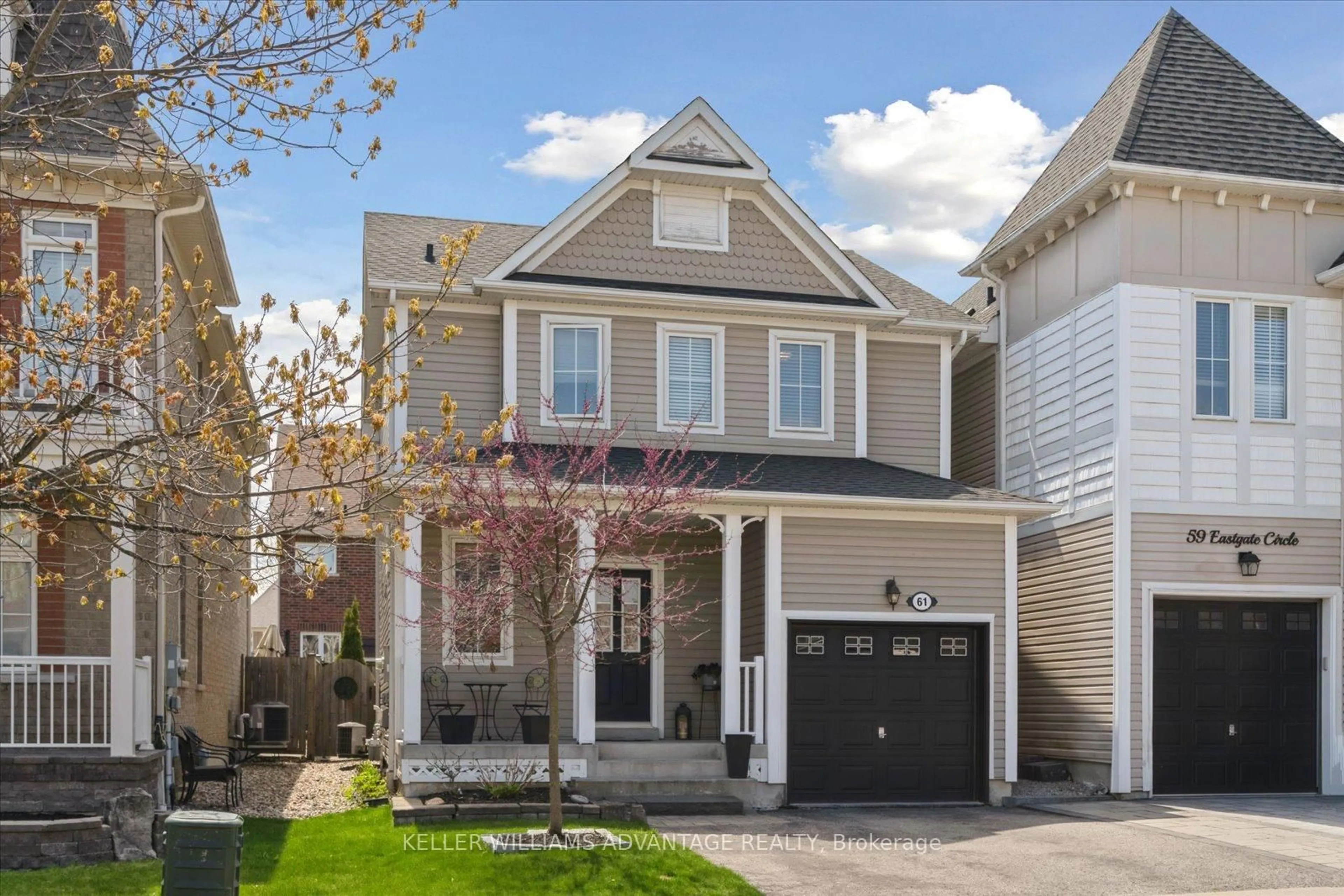 Home with vinyl exterior material, street for 61 Eastgate Circ, Whitby Ontario L1M 2N4