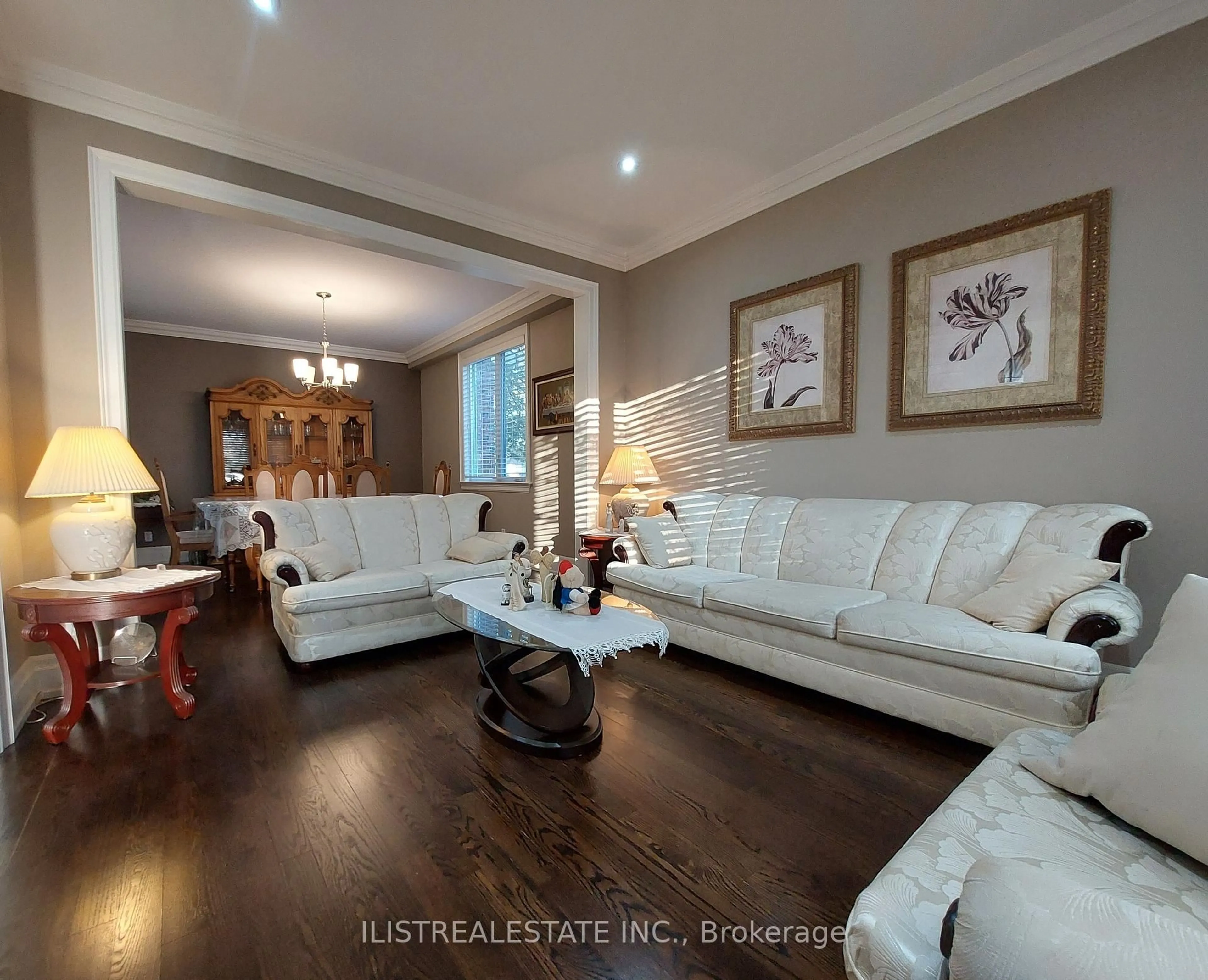 Living room with furniture, wood/laminate floor for 59 Princemere Cres, Toronto Ontario M1R 3X1