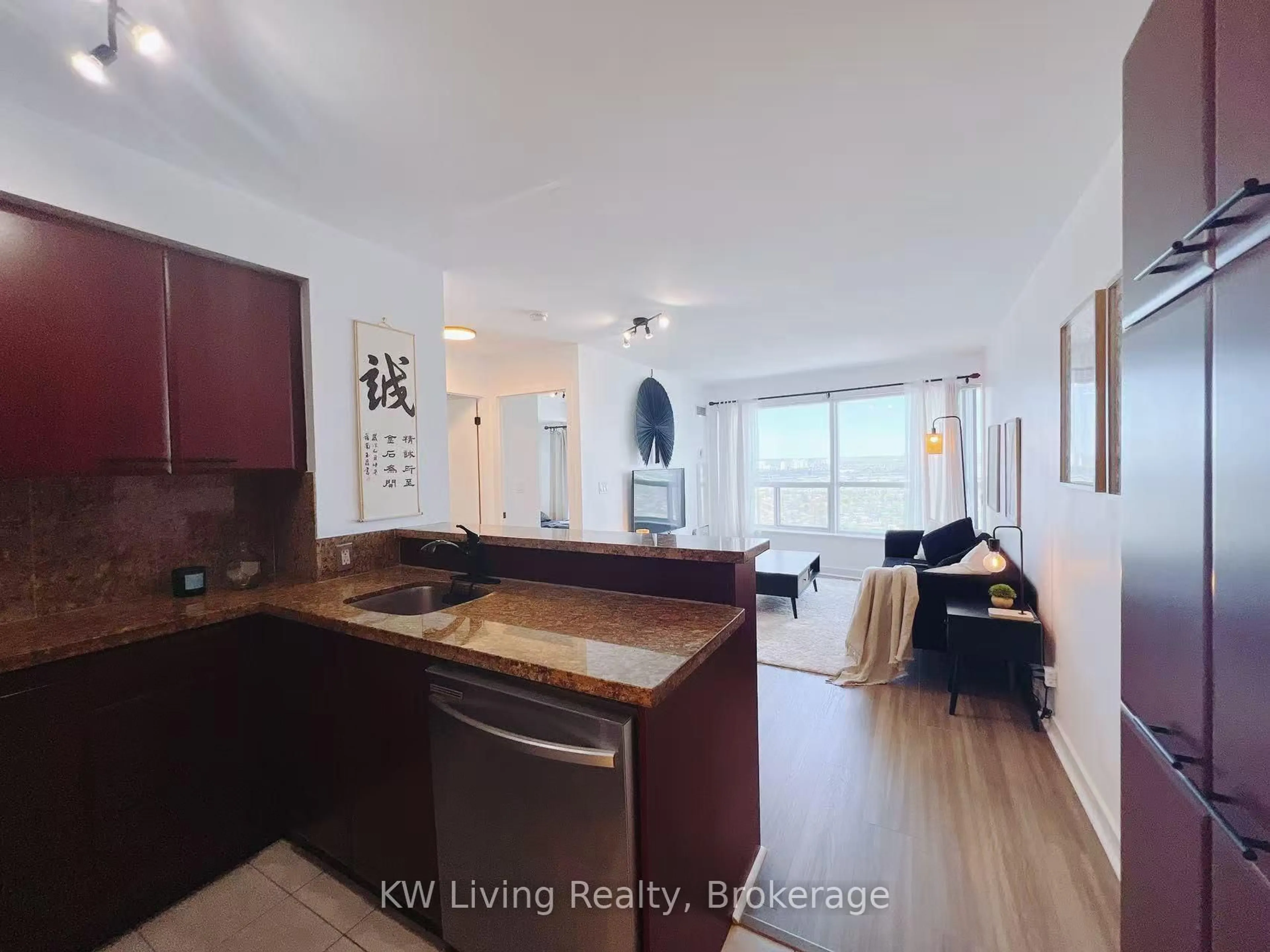 Open concept kitchen, wood/laminate floor for 38 Lee Centre Dr #3502, Toronto Ontario M1H 3J7