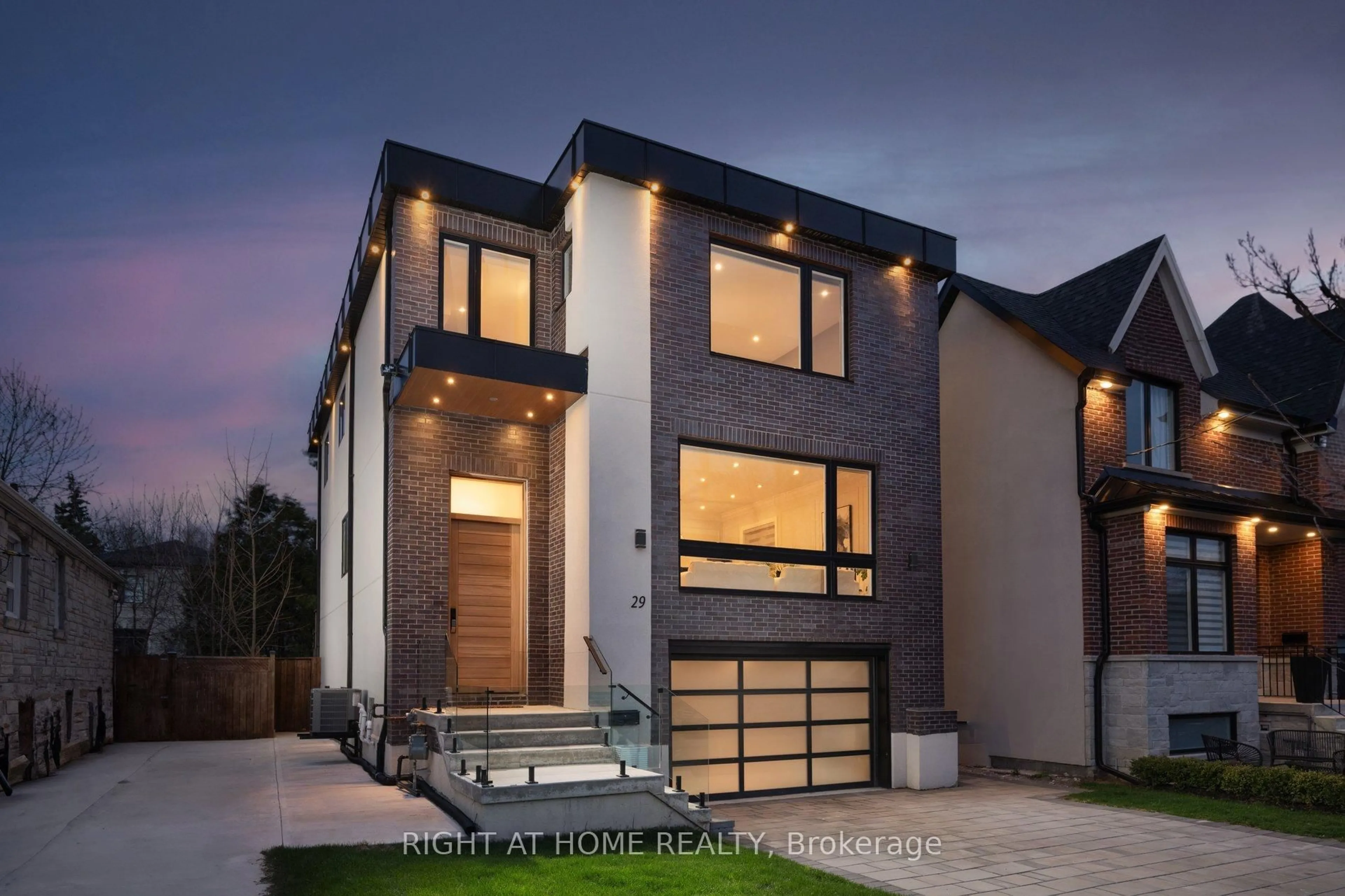 Home with brick exterior material, street for 29 Machockie Rd, Toronto Ontario M4C 3M5