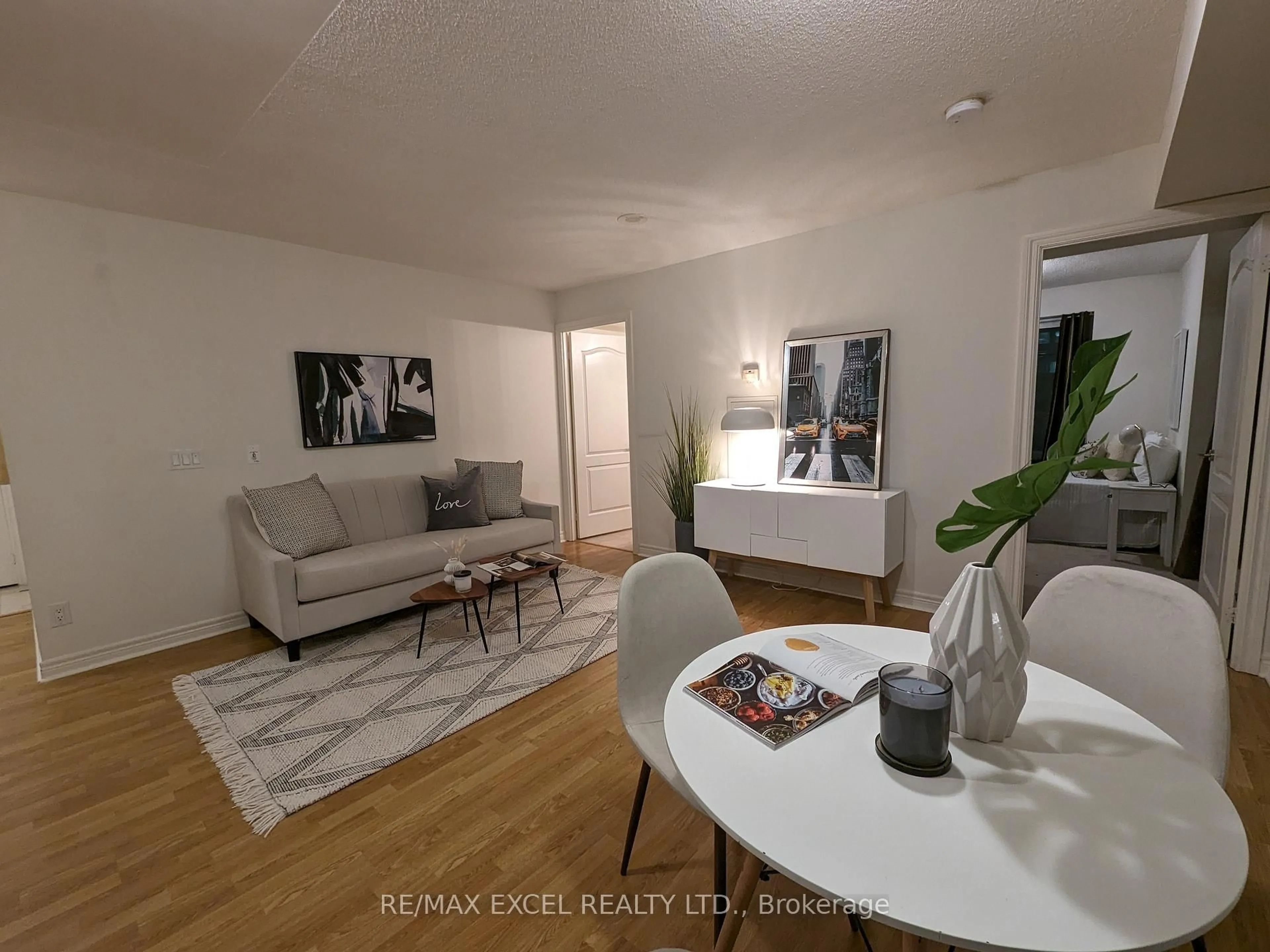 Living room with furniture, unknown for 60 Town Centre Crt #403, Toronto Ontario M1P 0B1
