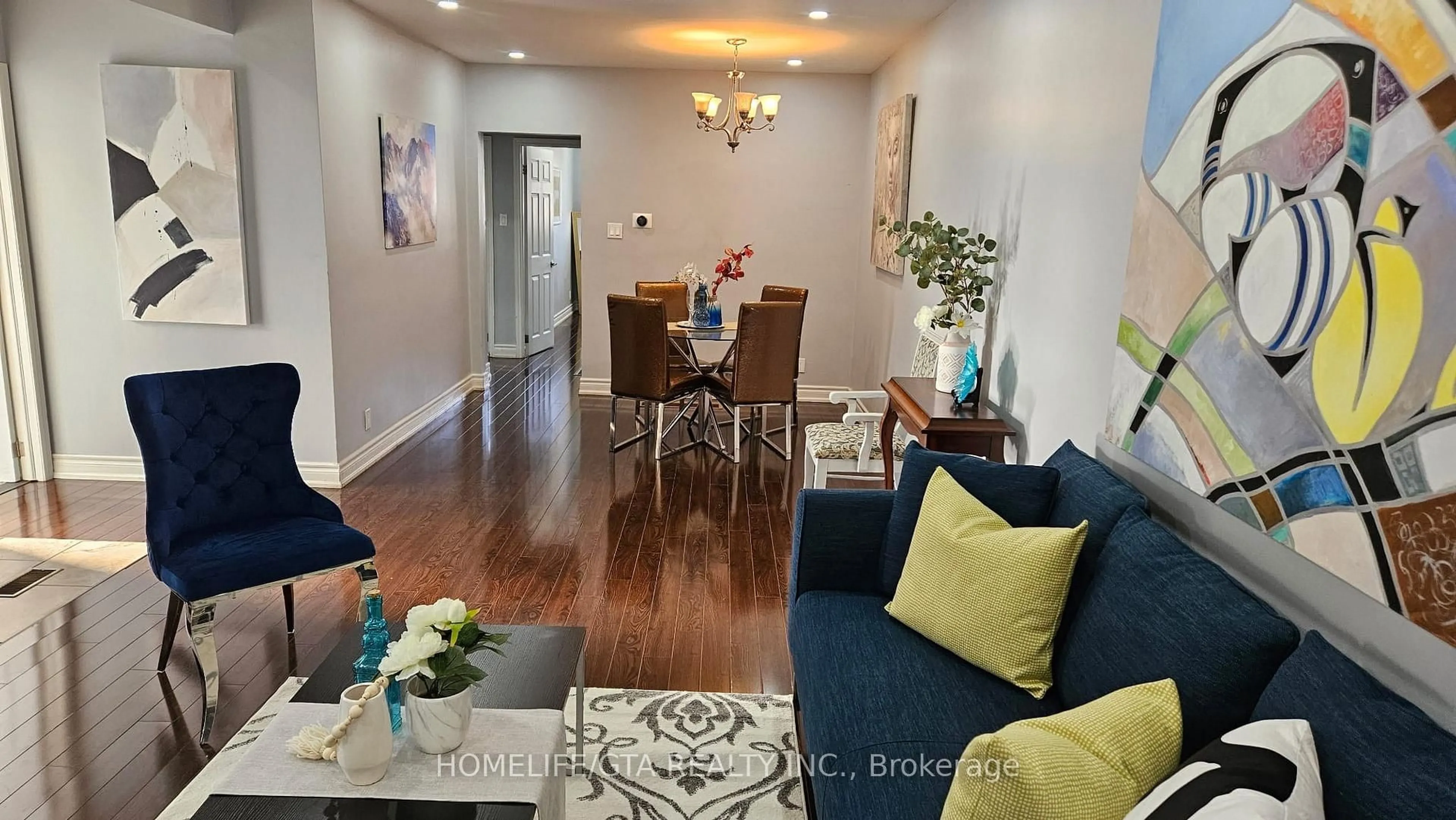 Living room with furniture, wood/laminate floor for 43 Thorncroft Cres, Ajax Ontario L1S 2S1
