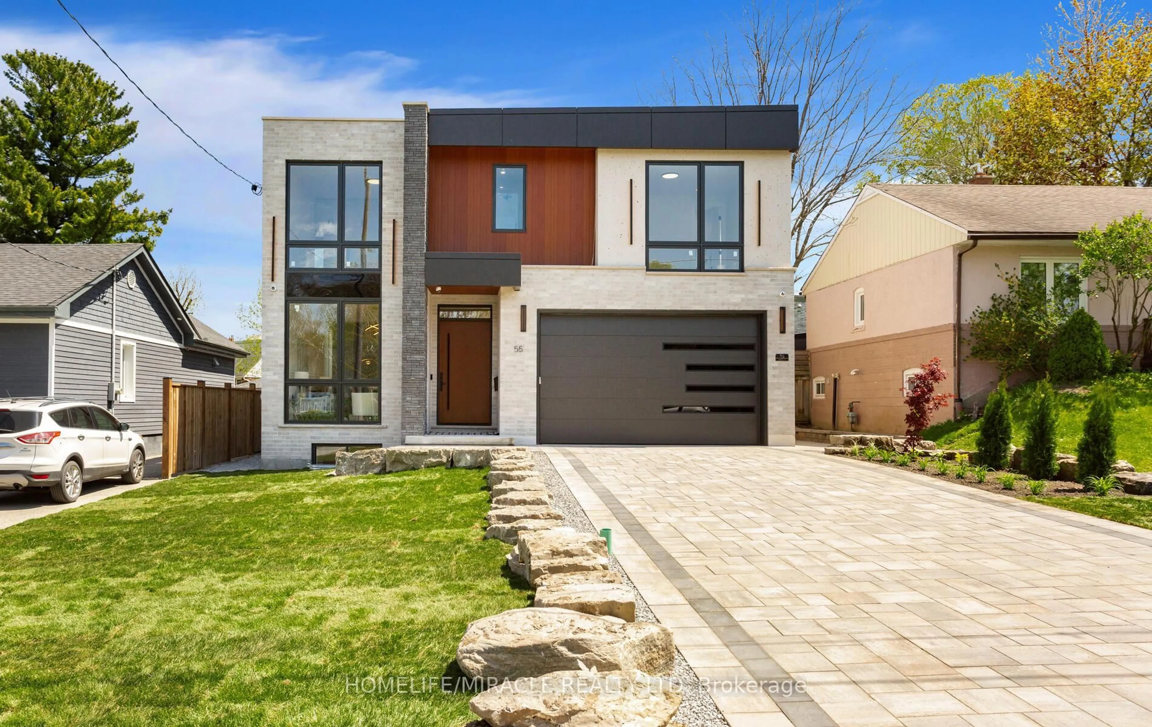 Home with brick exterior material, street for 55 Adanac Dr, Toronto Ontario M1M 2E6