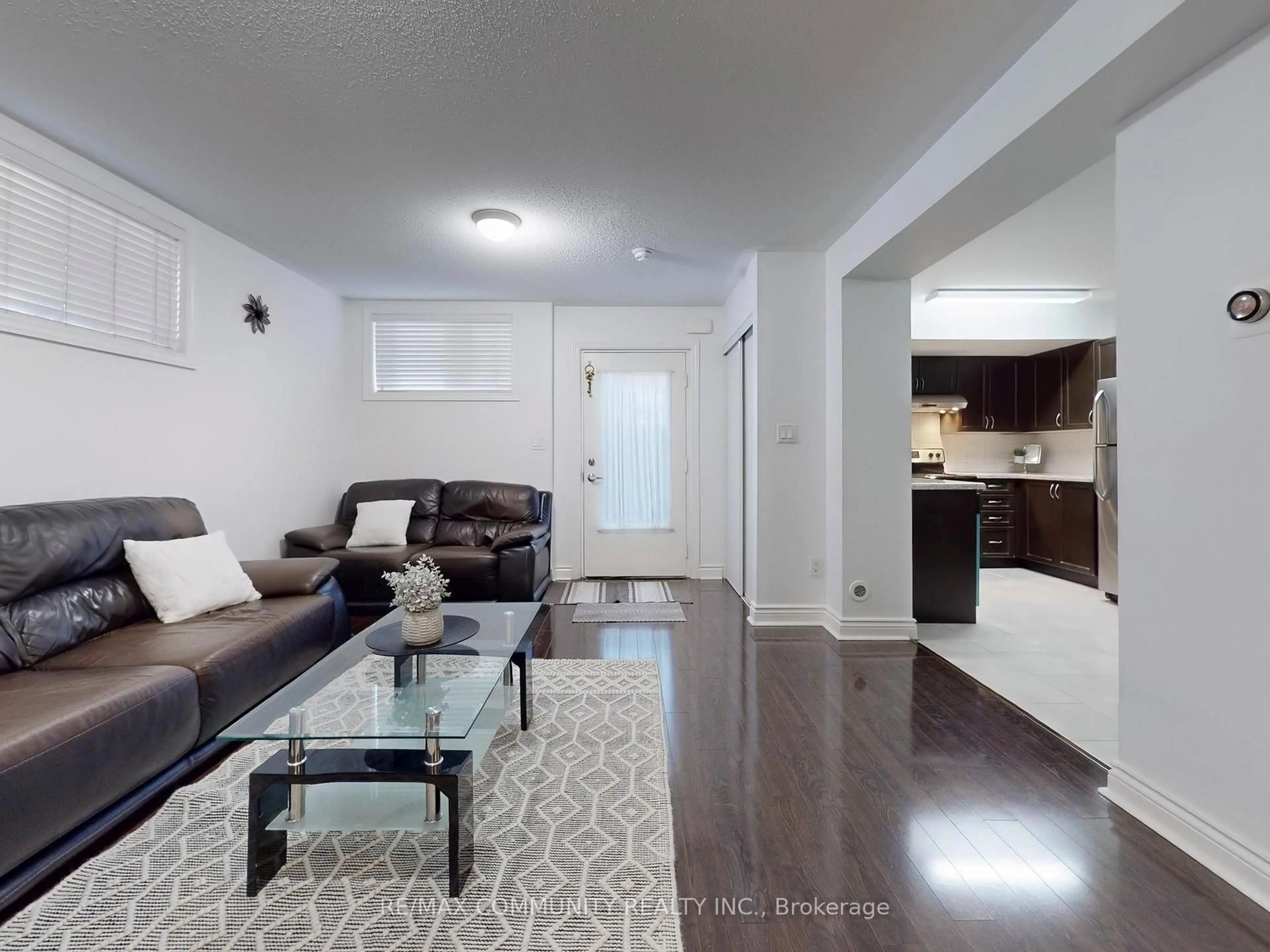 Living room with furniture, unknown for 1785 Markham Rd #101, Toronto Ontario M1B 2Z7