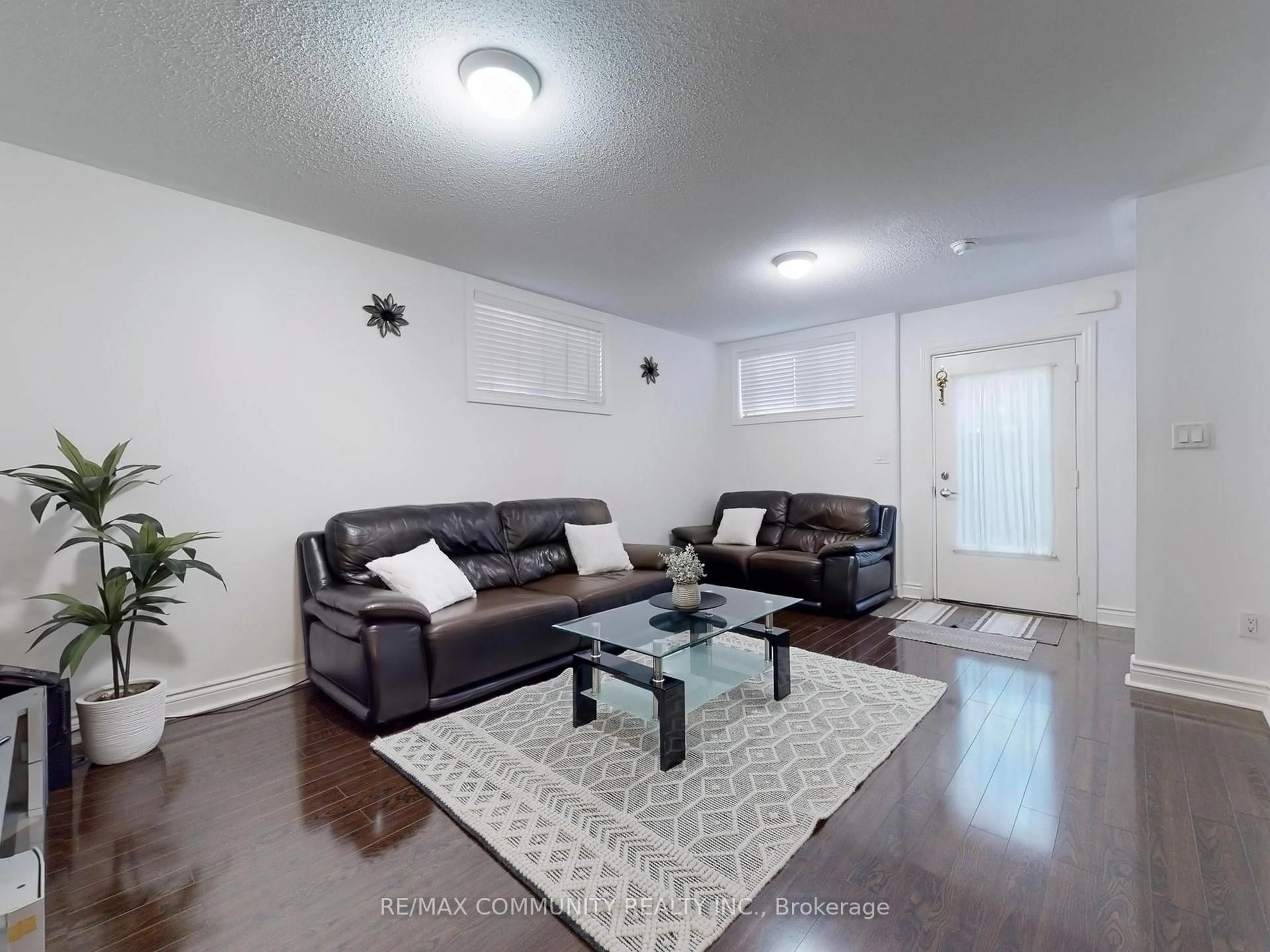 Living room with furniture, unknown for 1785 Markham Rd #101, Toronto Ontario M1B 2Z7