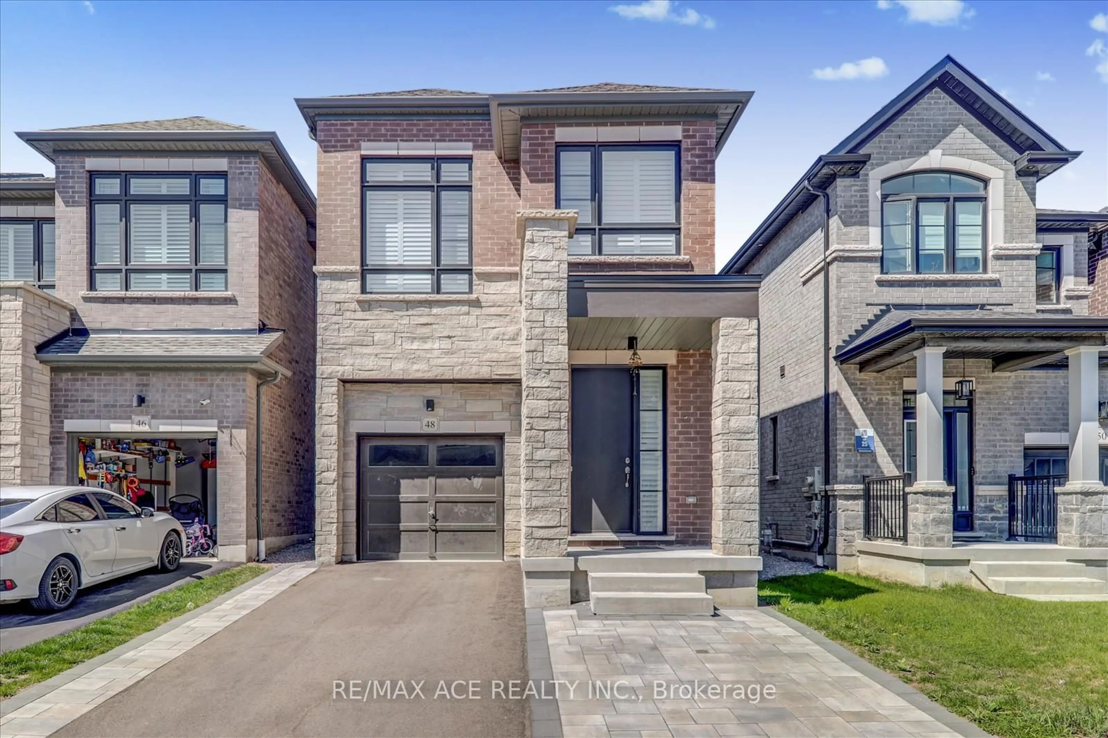 Home with brick exterior material, street for 48 Closson Dr, Whitby Ontario L1P 0N1