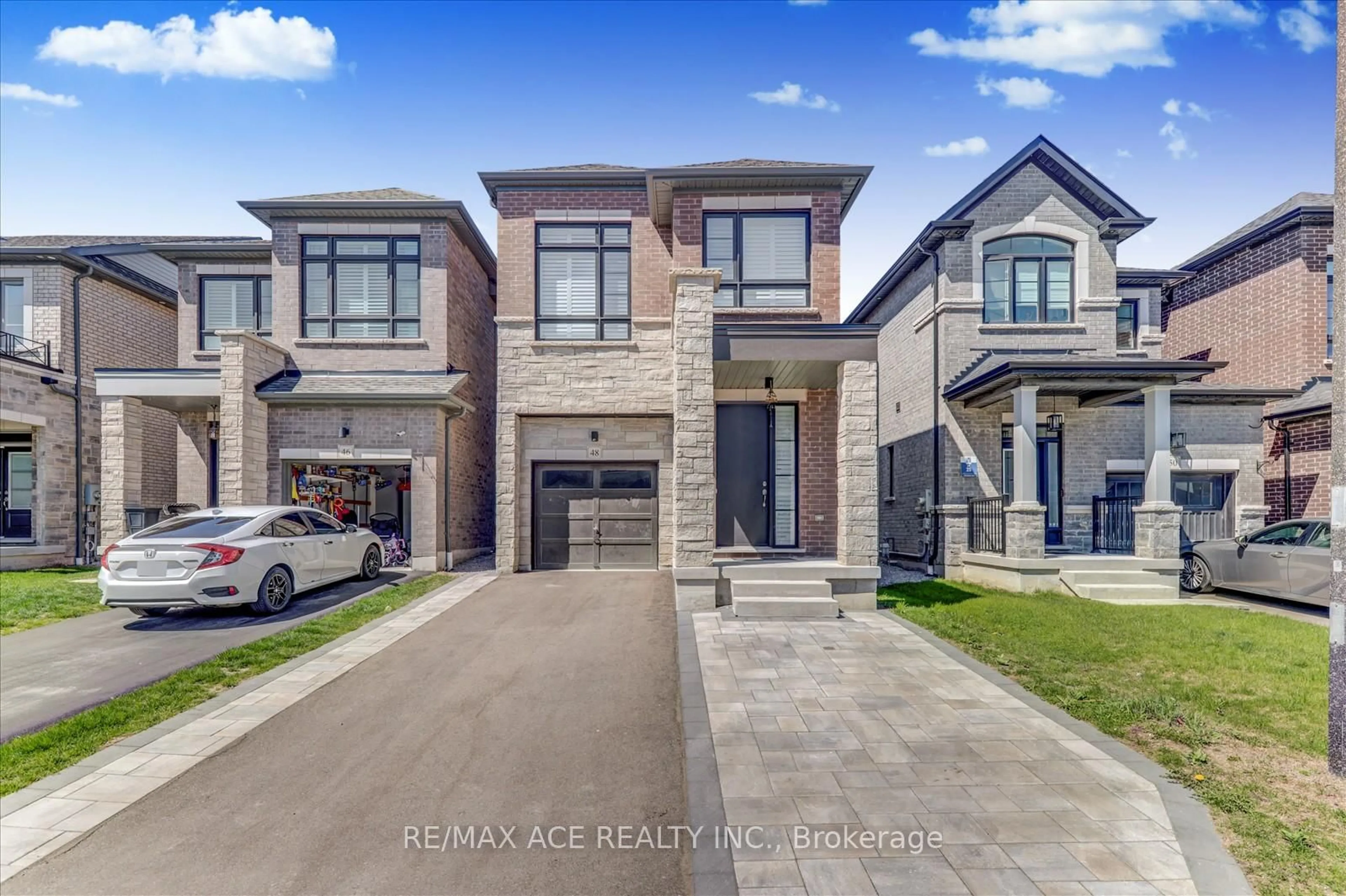 Home with brick exterior material, street for 48 Closson Dr, Whitby Ontario L1P 0N1