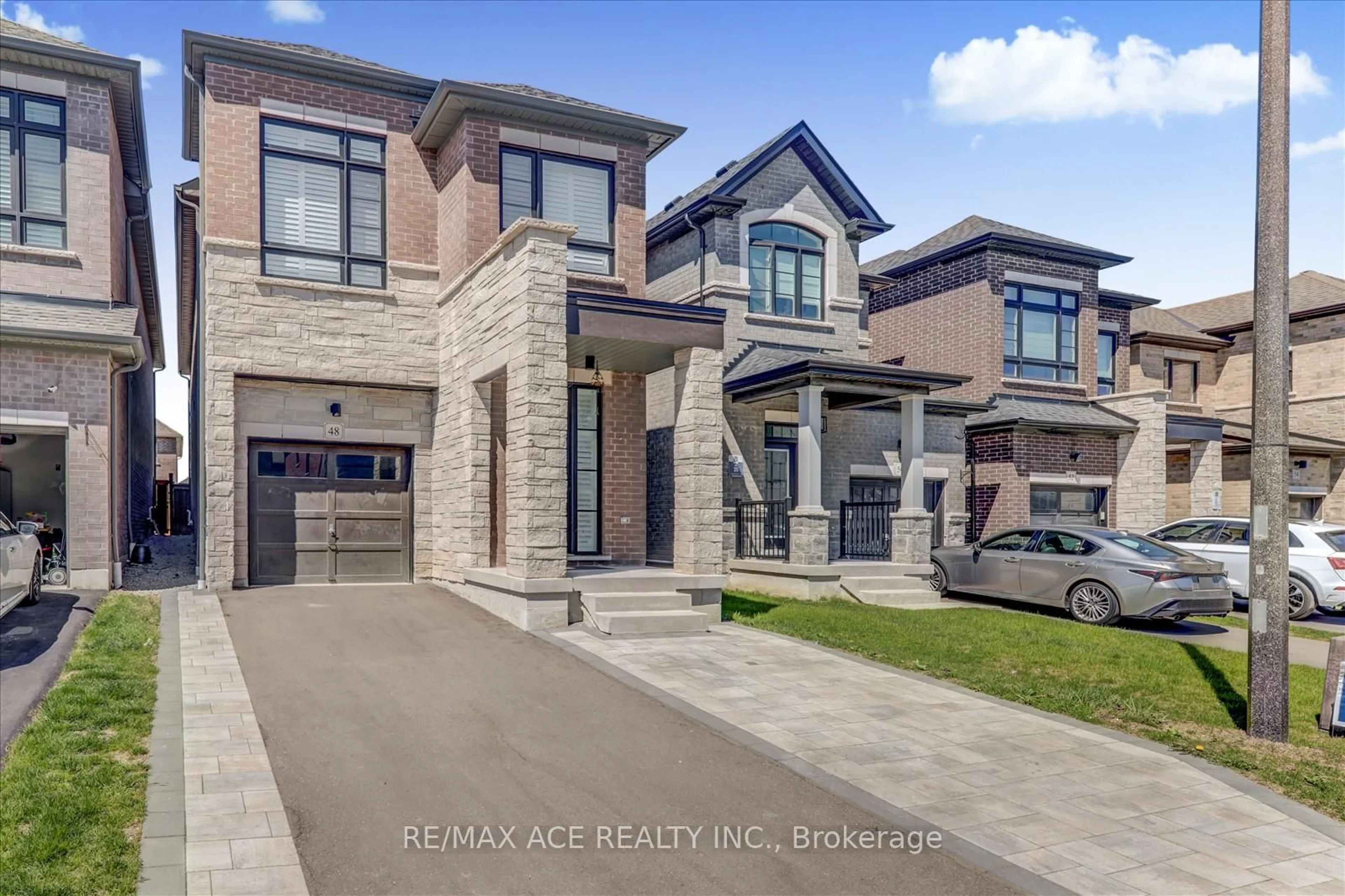 Home with brick exterior material, street for 48 Closson Dr, Whitby Ontario L1P 0N1