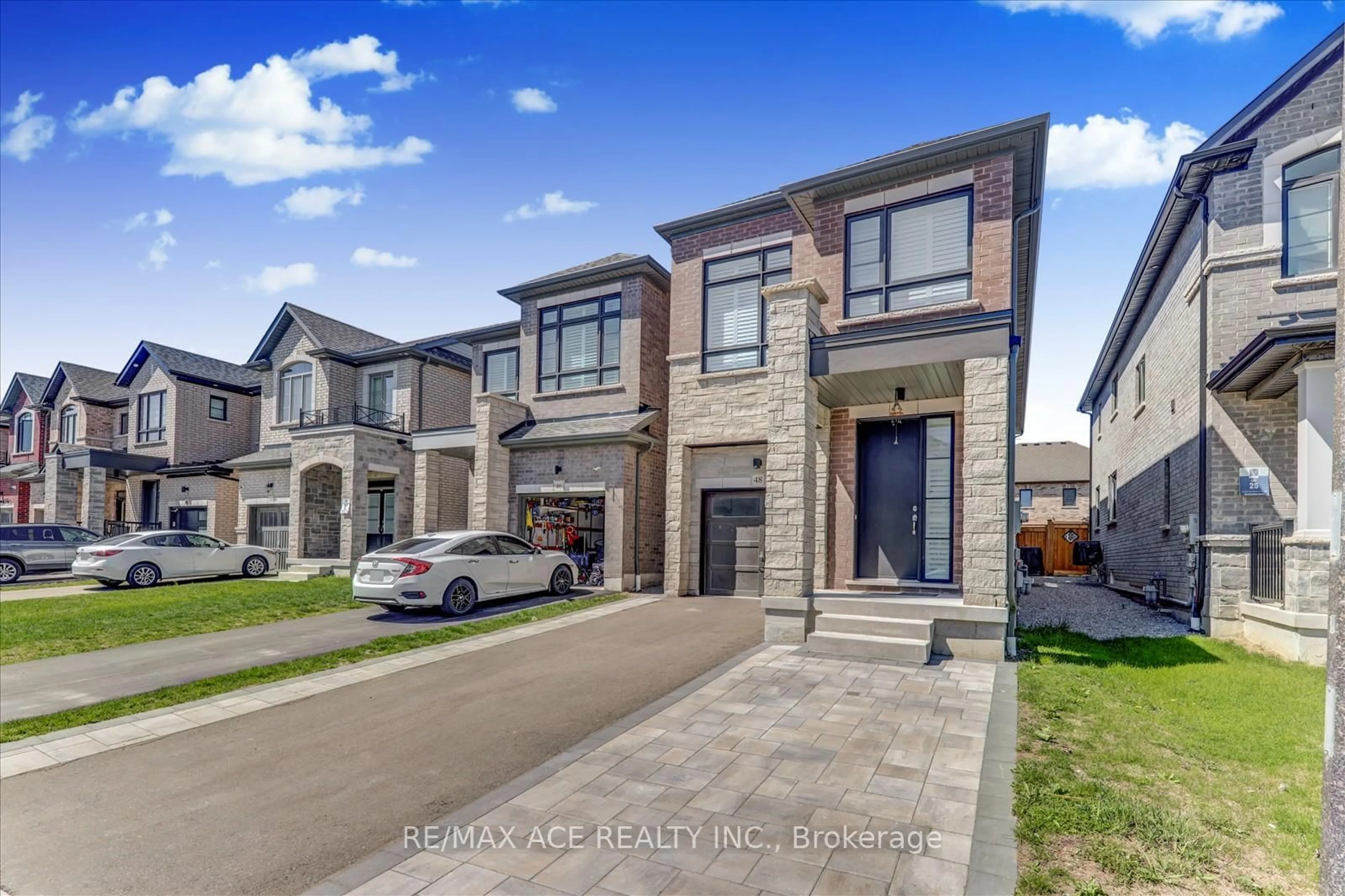 Home with brick exterior material, street for 48 Closson Dr, Whitby Ontario L1P 0N1