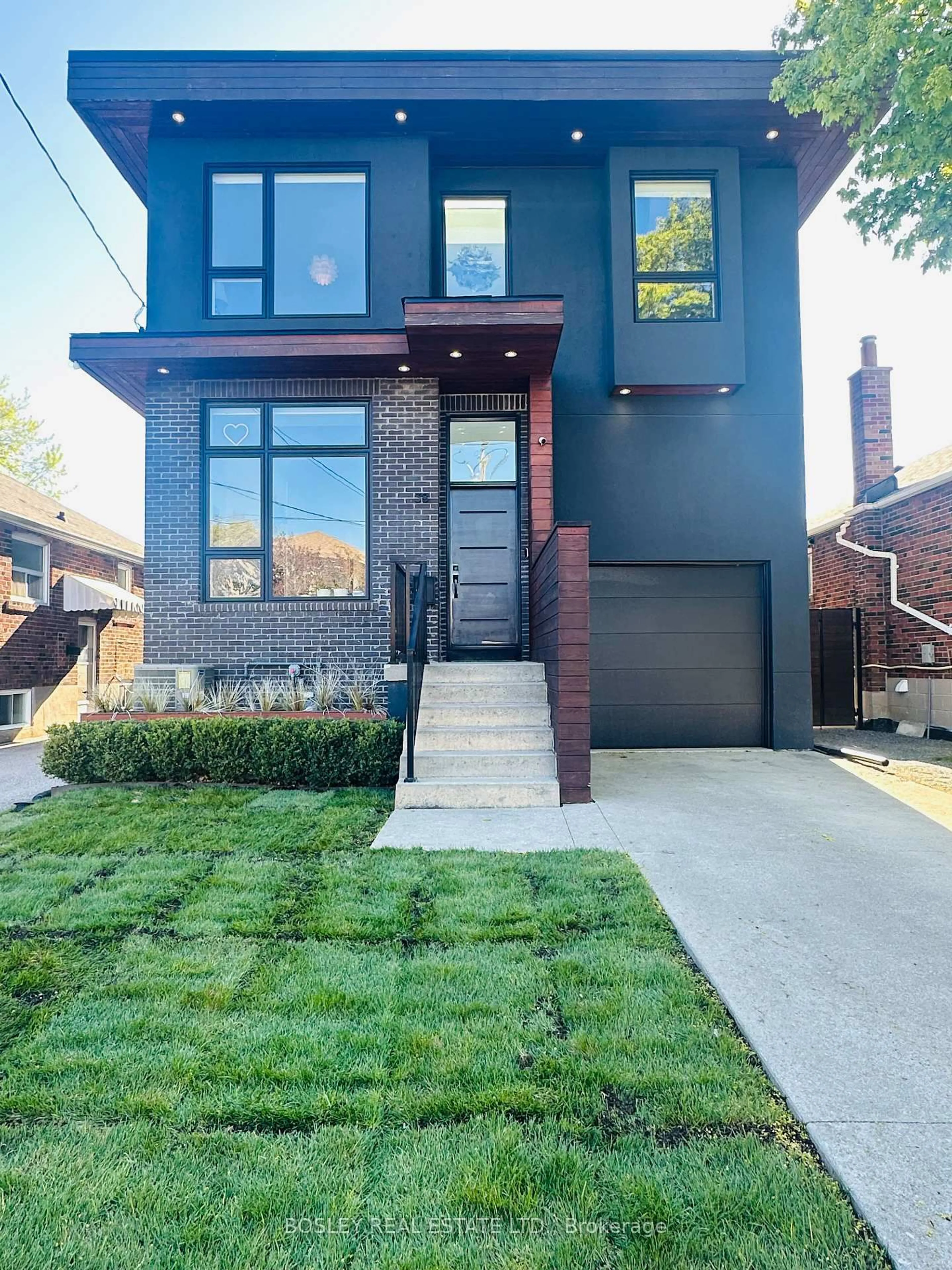 Home with brick exterior material, street for 38 Roblin Ave, Toronto Ontario M4C 3R1