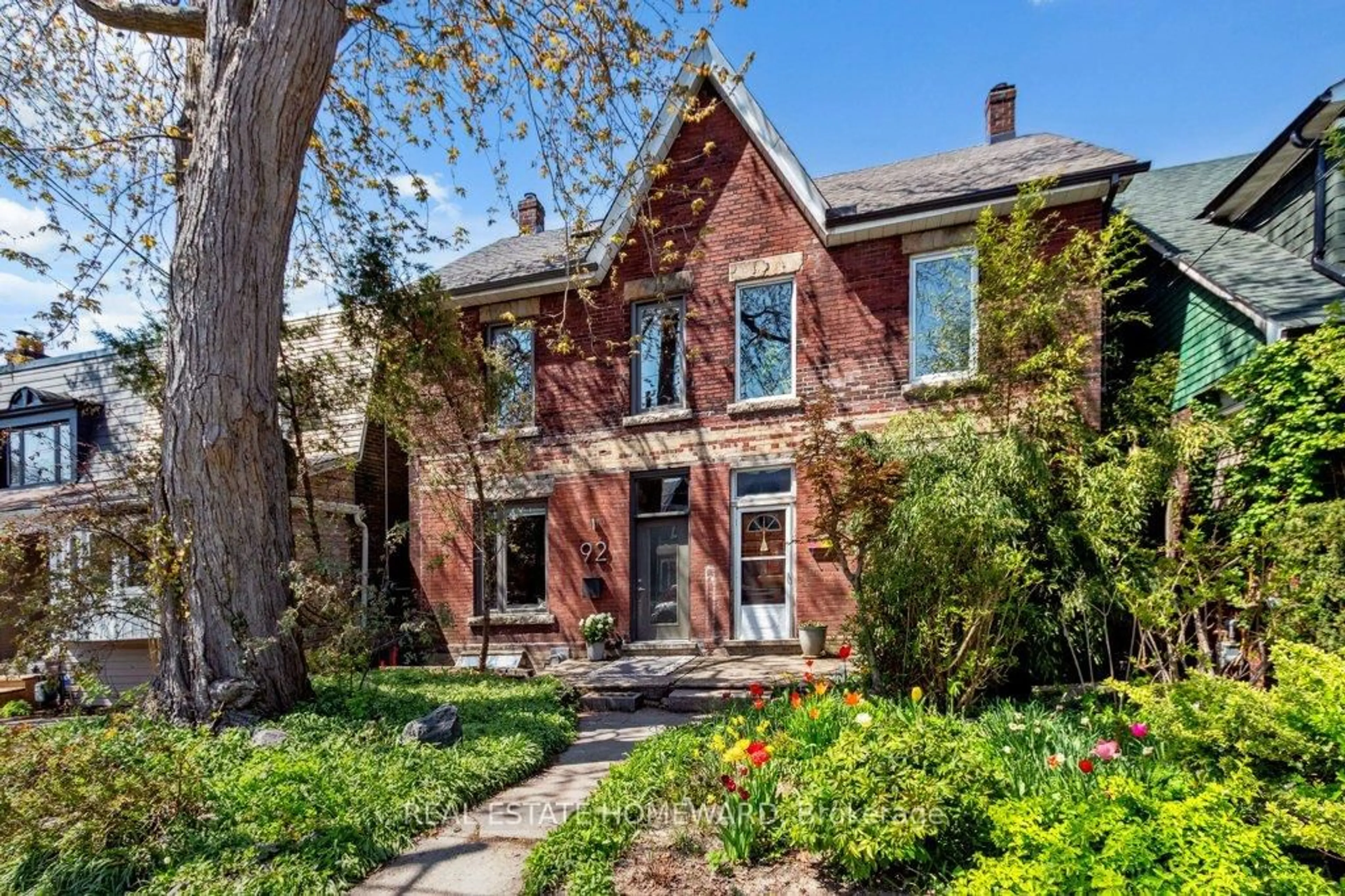 Home with brick exterior material, street for 92 Greenwood Ave, Toronto Ontario M4L 2P6
