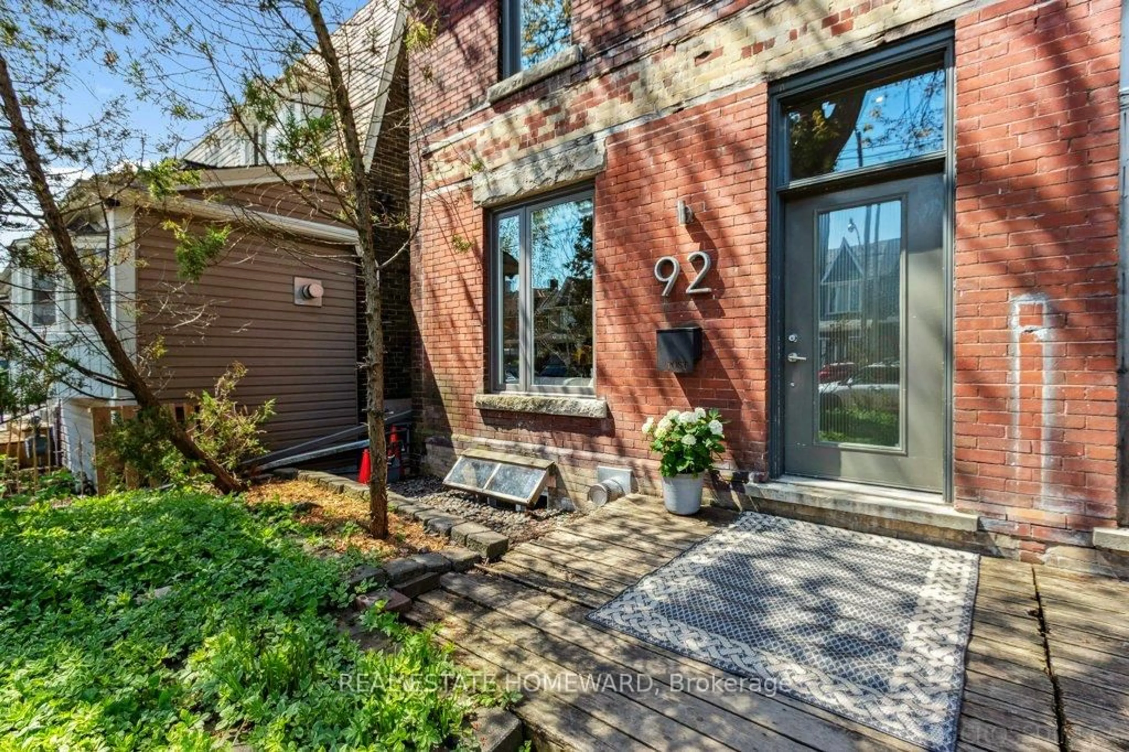 Home with brick exterior material, street for 92 Greenwood Ave, Toronto Ontario M4L 2P6