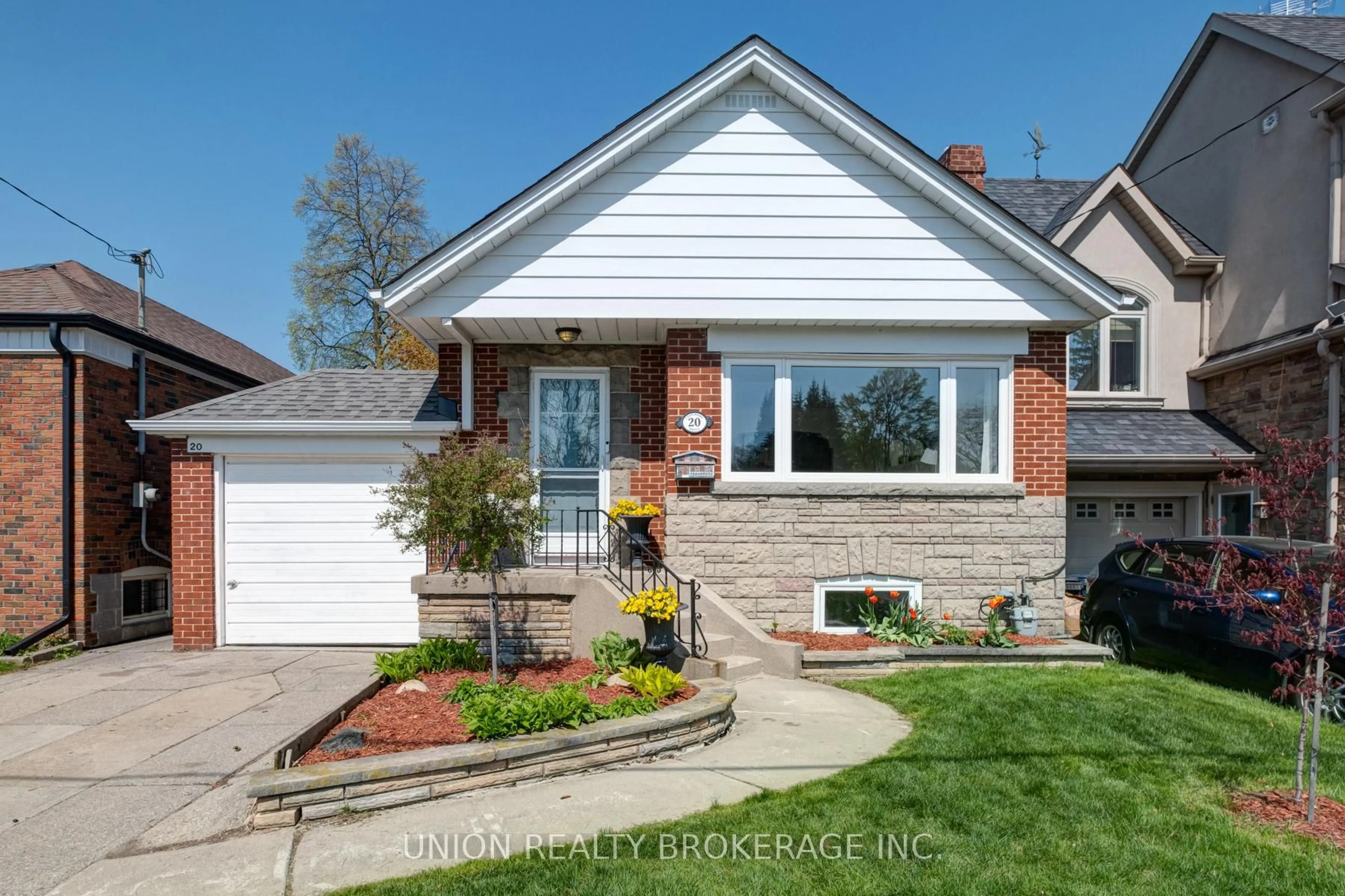 Home with brick exterior material, street for 20 Clonmore Dr, Toronto Ontario M1N 1X5