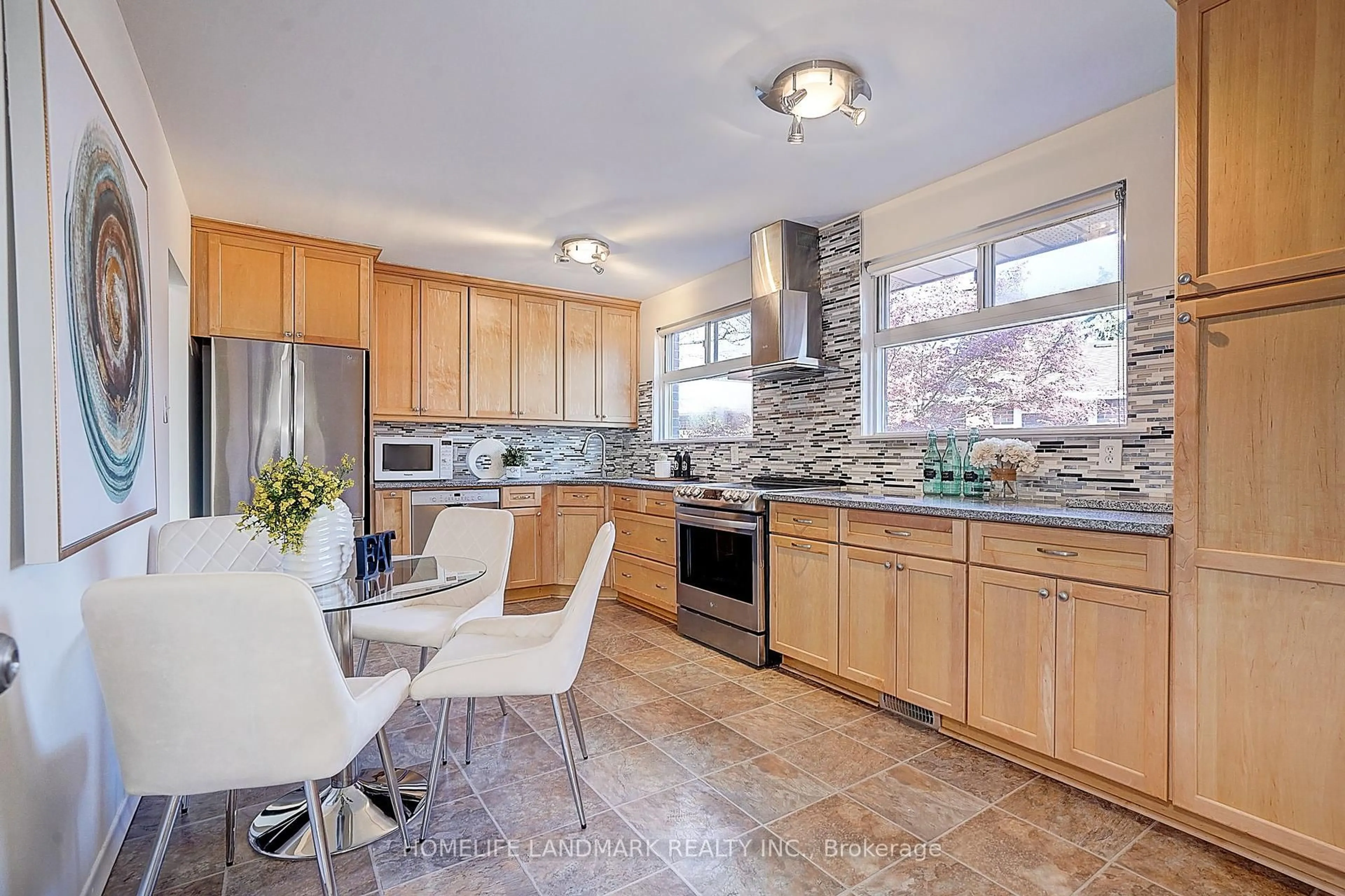 Open concept kitchen, ceramic/tile floor for 74 Invergordon Ave, Toronto Ontario M1S 2Z2