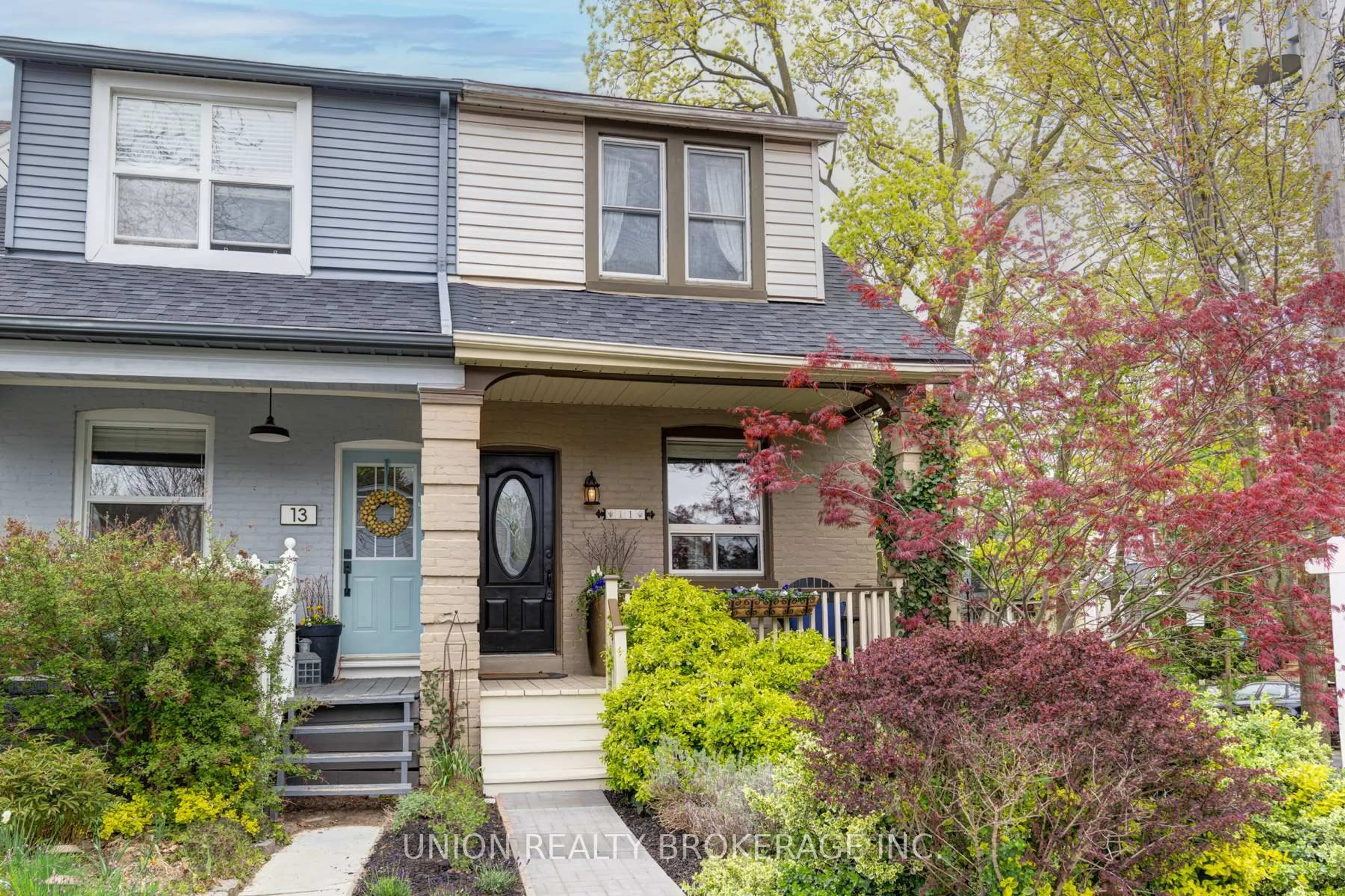 Home with vinyl exterior material, street for 11 Roseheath Ave, Toronto Ontario M4C 3P3