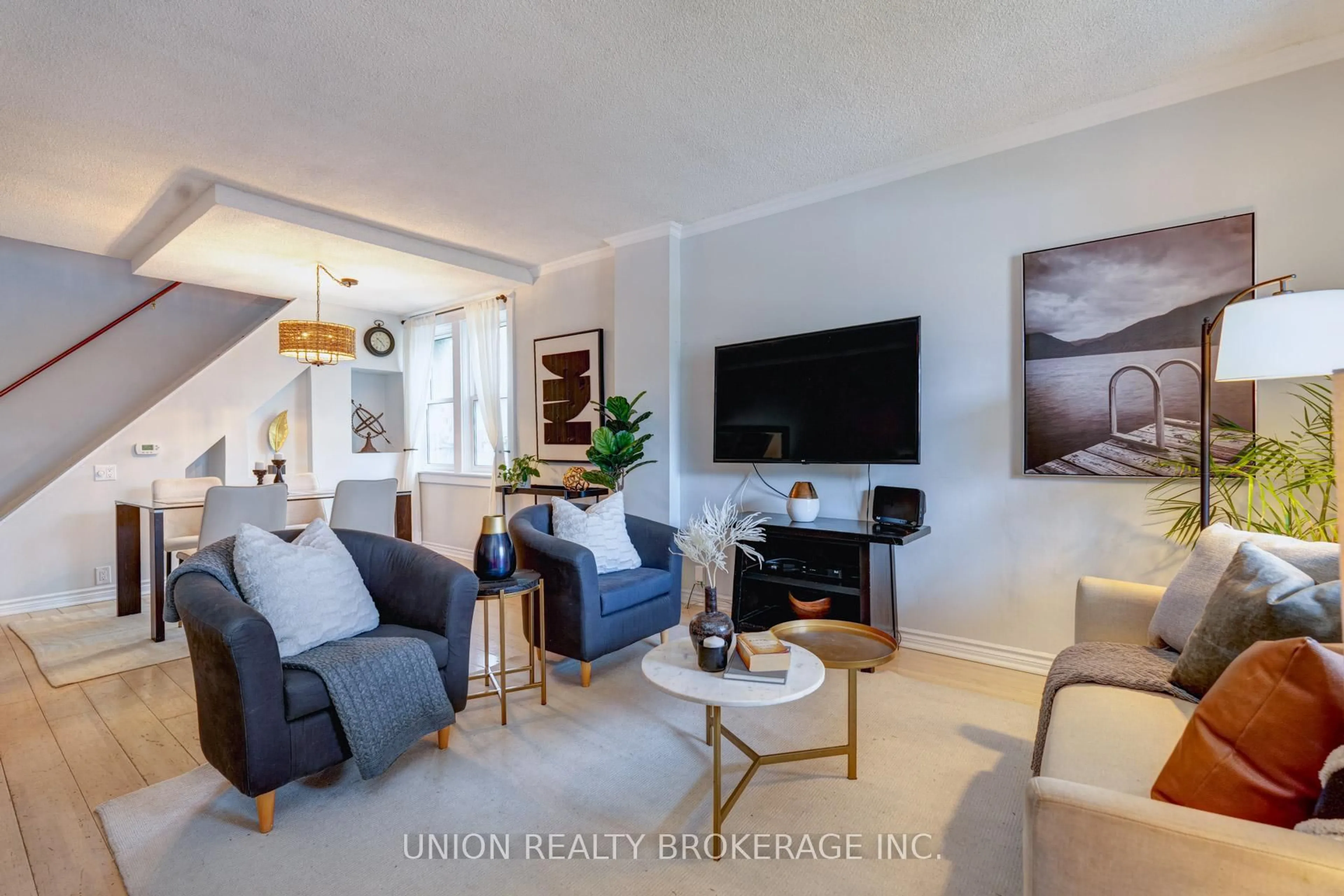 Living room with furniture, unknown for 11 Roseheath Ave, Toronto Ontario M4C 3P3